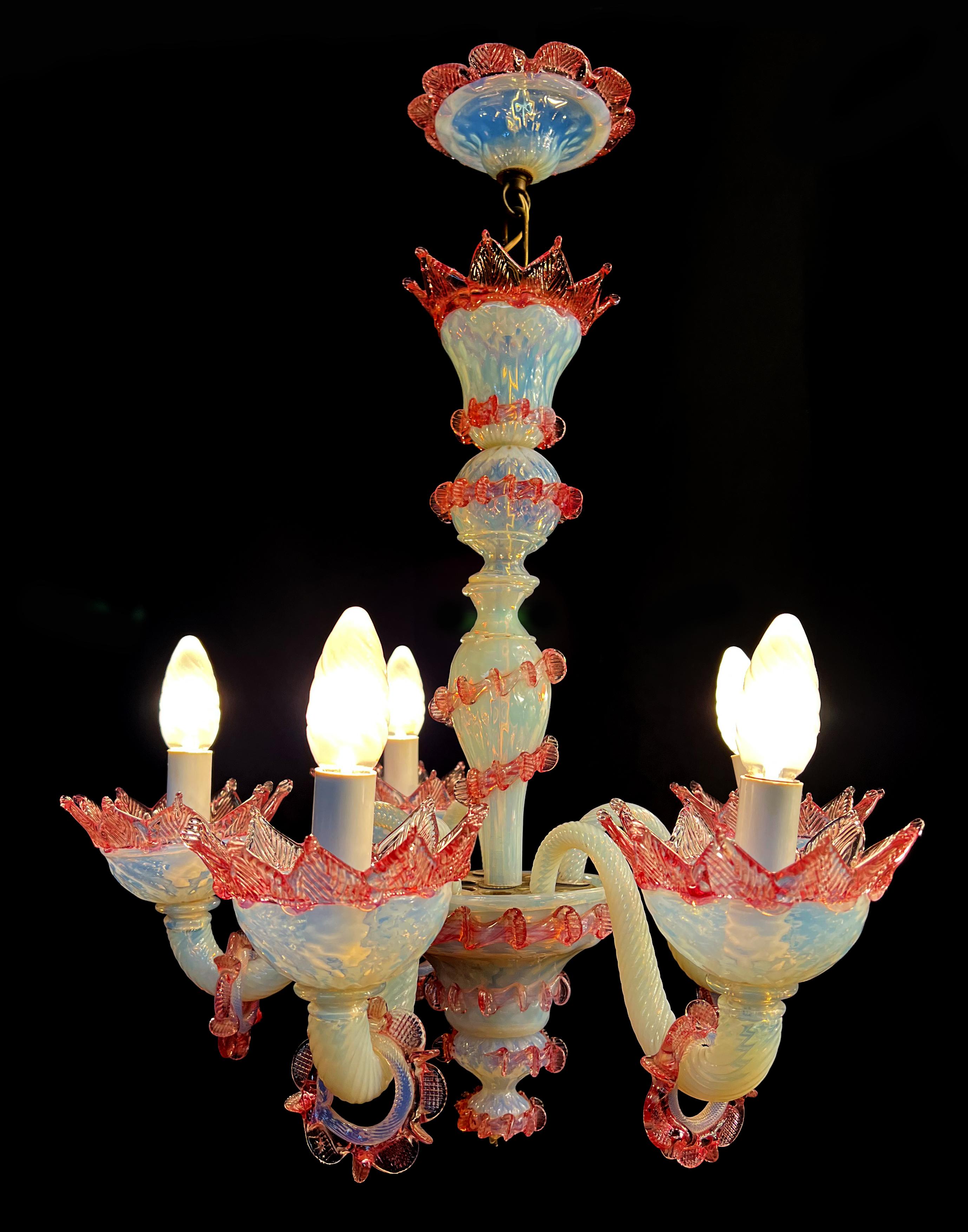 Murano chandelier of awesome beauty. Lights (5) in pure Murano glass paste. Each piece is a jewel.