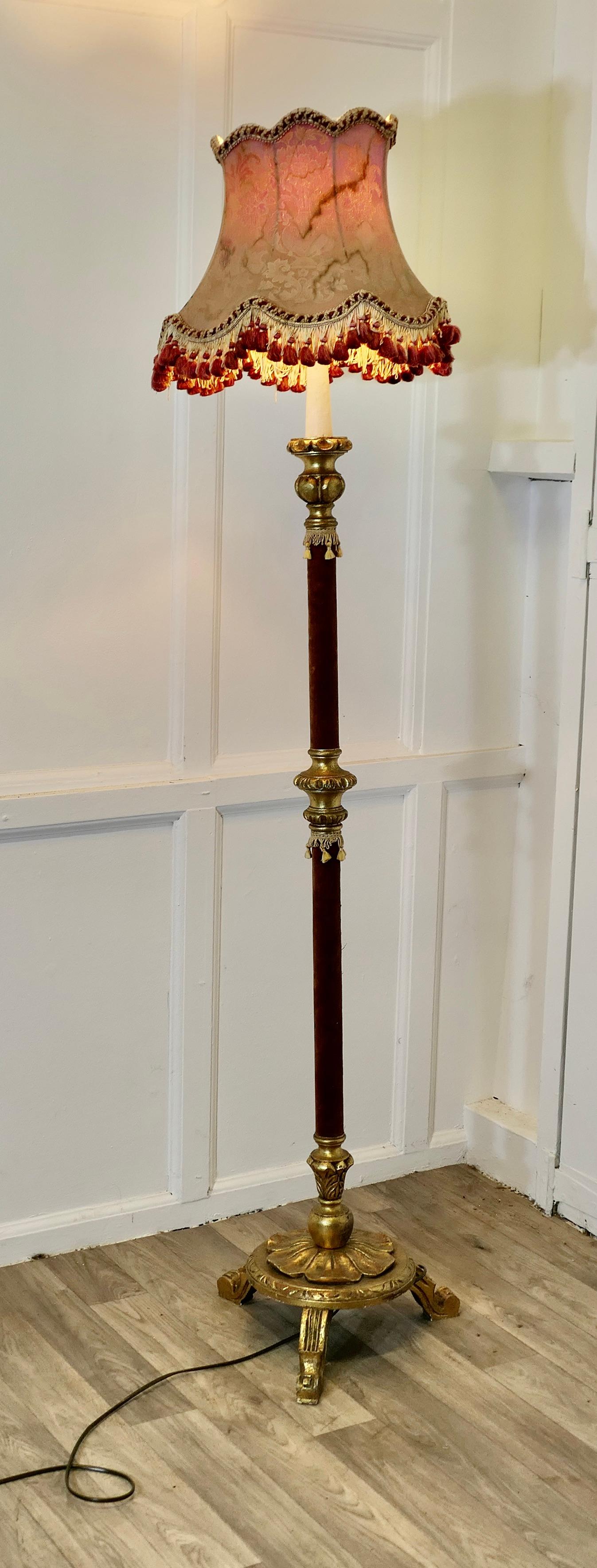 Charming Little French Boudoir Floor Lamp

This is a delightful little piece, in plumb velvet and gold and with its original silk brocade shade which is old and has some staining to the fabric
But so very attractive all working
The lamp is 66” tall