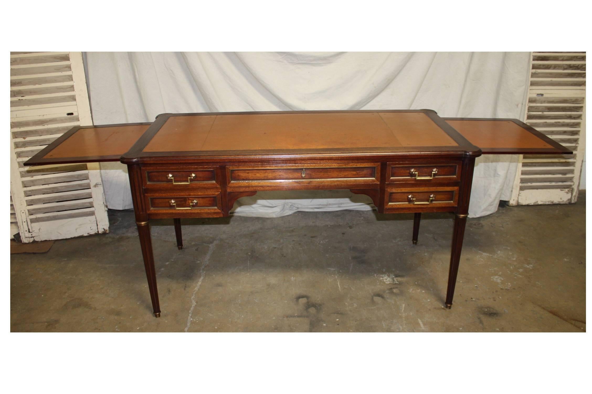 Charming Louis XVI style desk with two extensions on each side and its original leather top.
Each extension 16 inches W x 21.25 inches D.