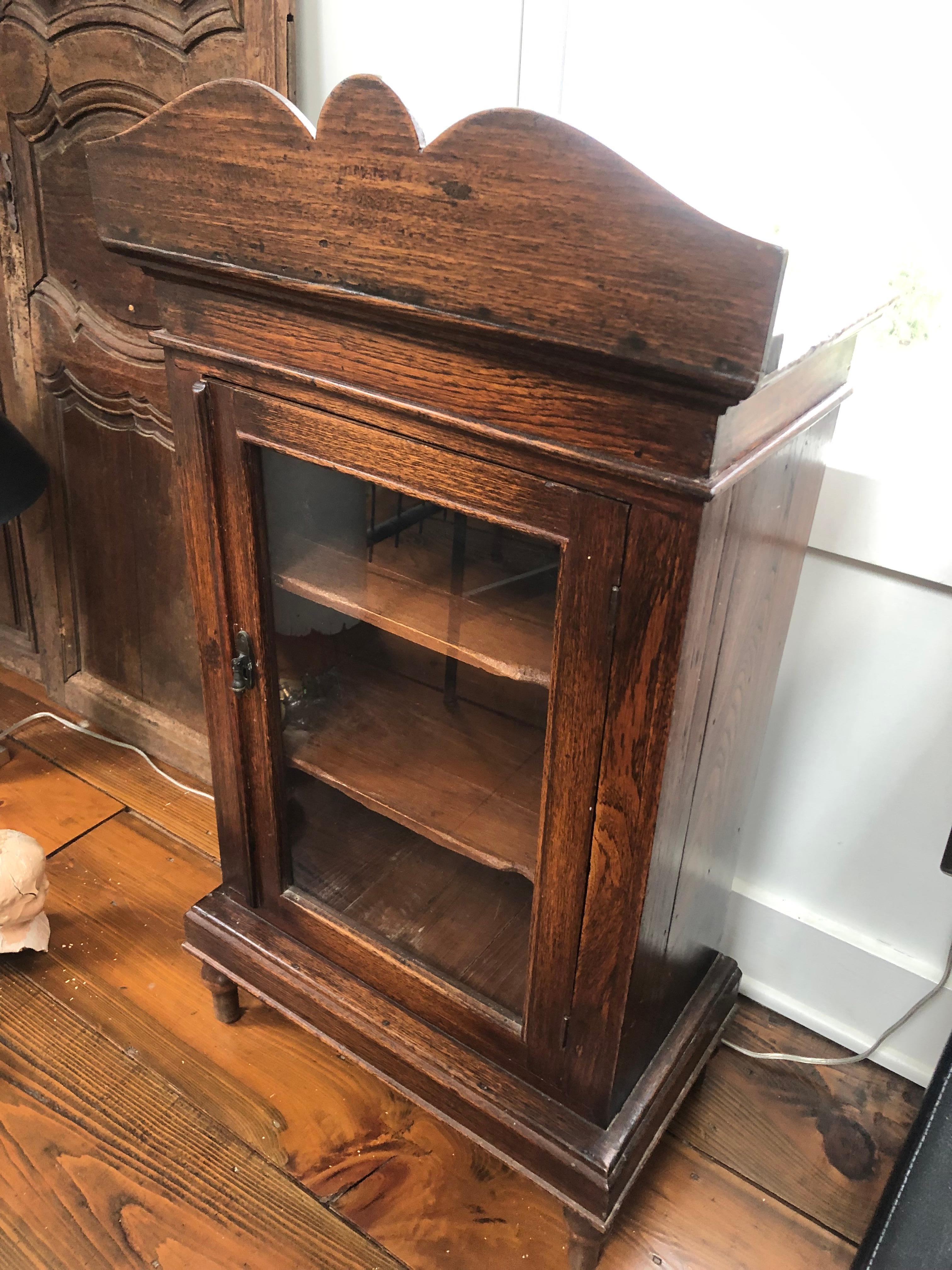 small curio cabinet with legs