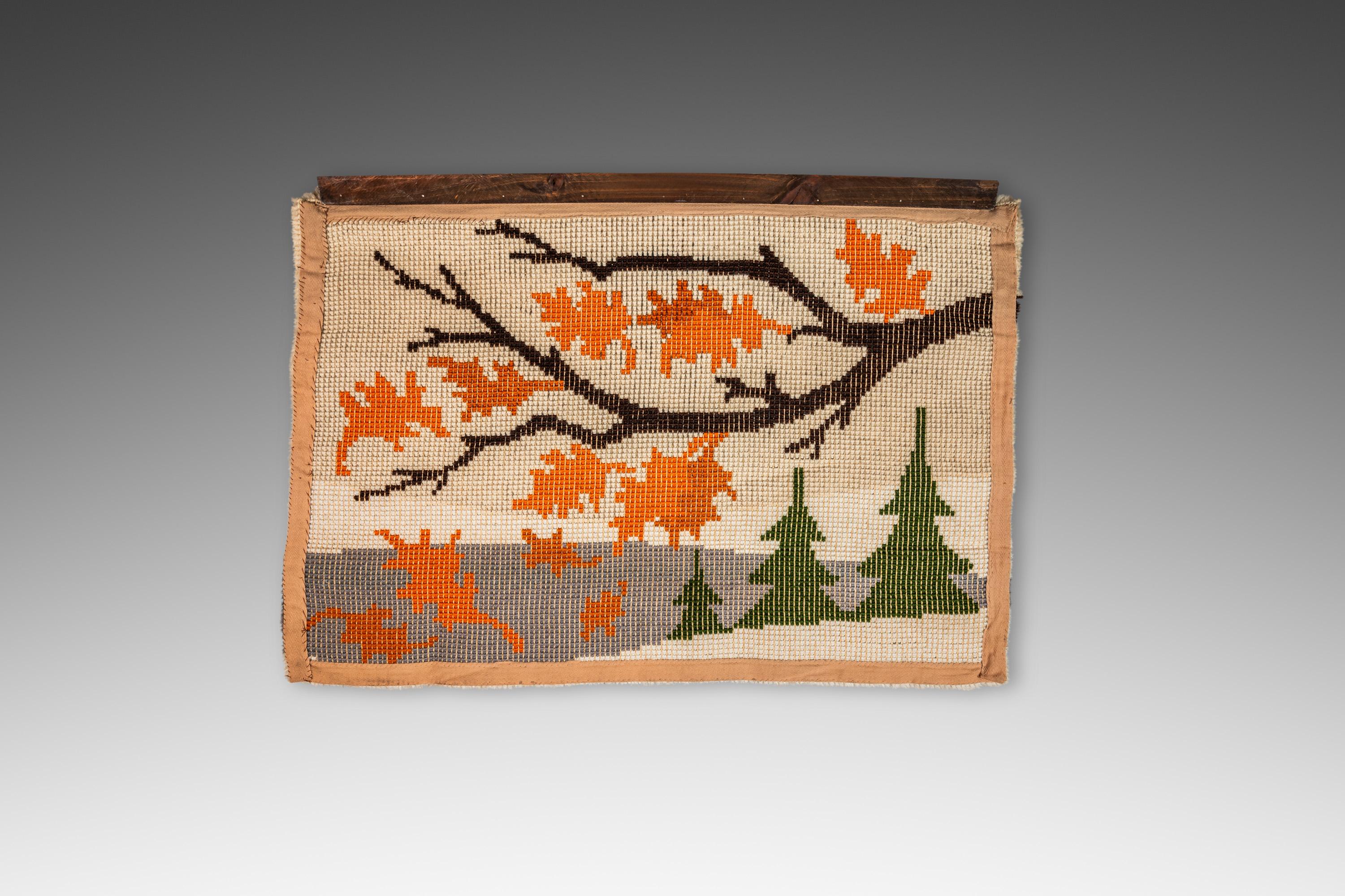 Equal parts charm and nostalgia this lovely hand-made, latch-hook tapestry is ideal for a cabin in the woods. With warm, vintage colors and intricate details this wall-art piece is sure to add a touch of delightful scenic depth to any room. Make it