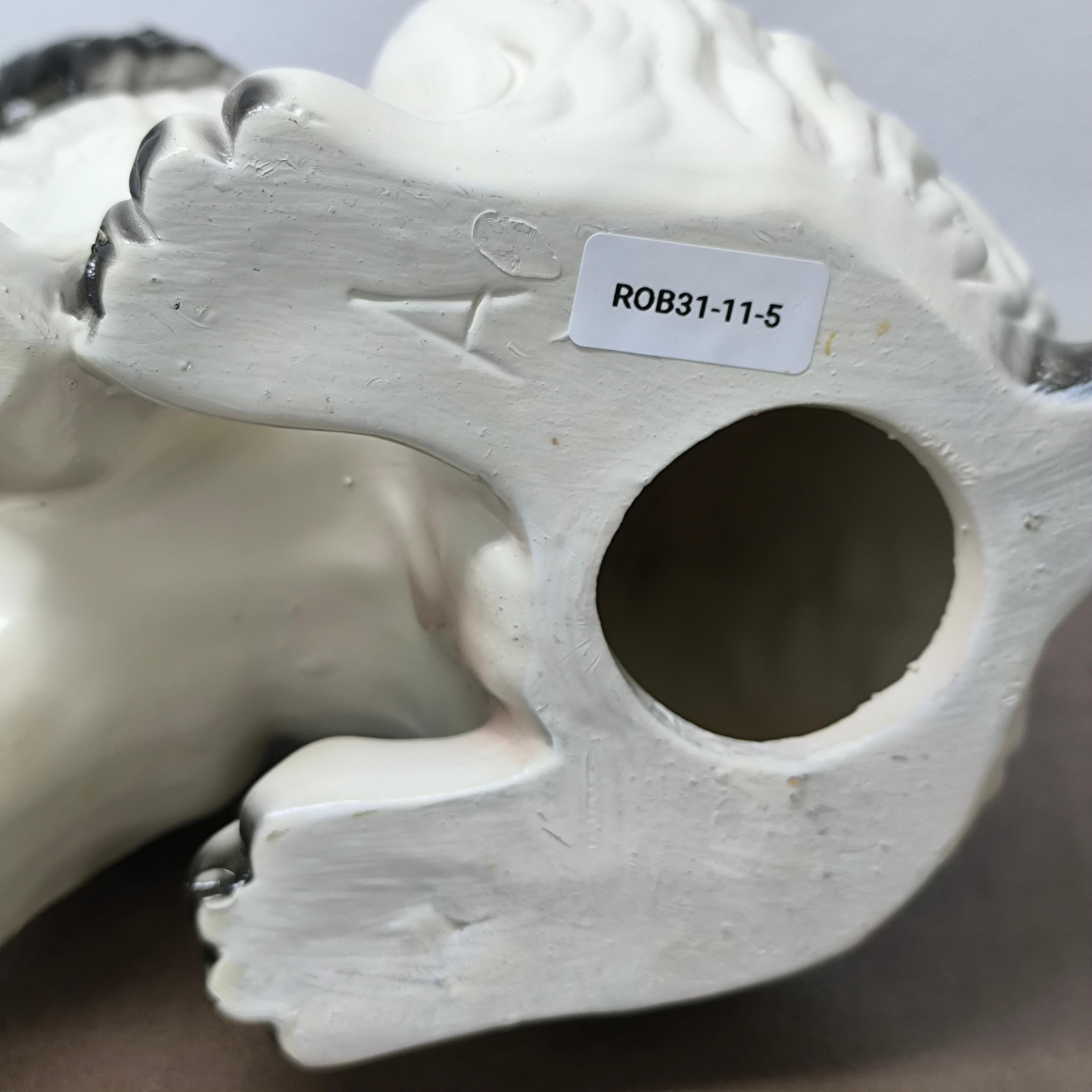 Affascinante statuetta di cane Spaniel in porcellana del metà del secolo con occhi espressivi in vendita 5