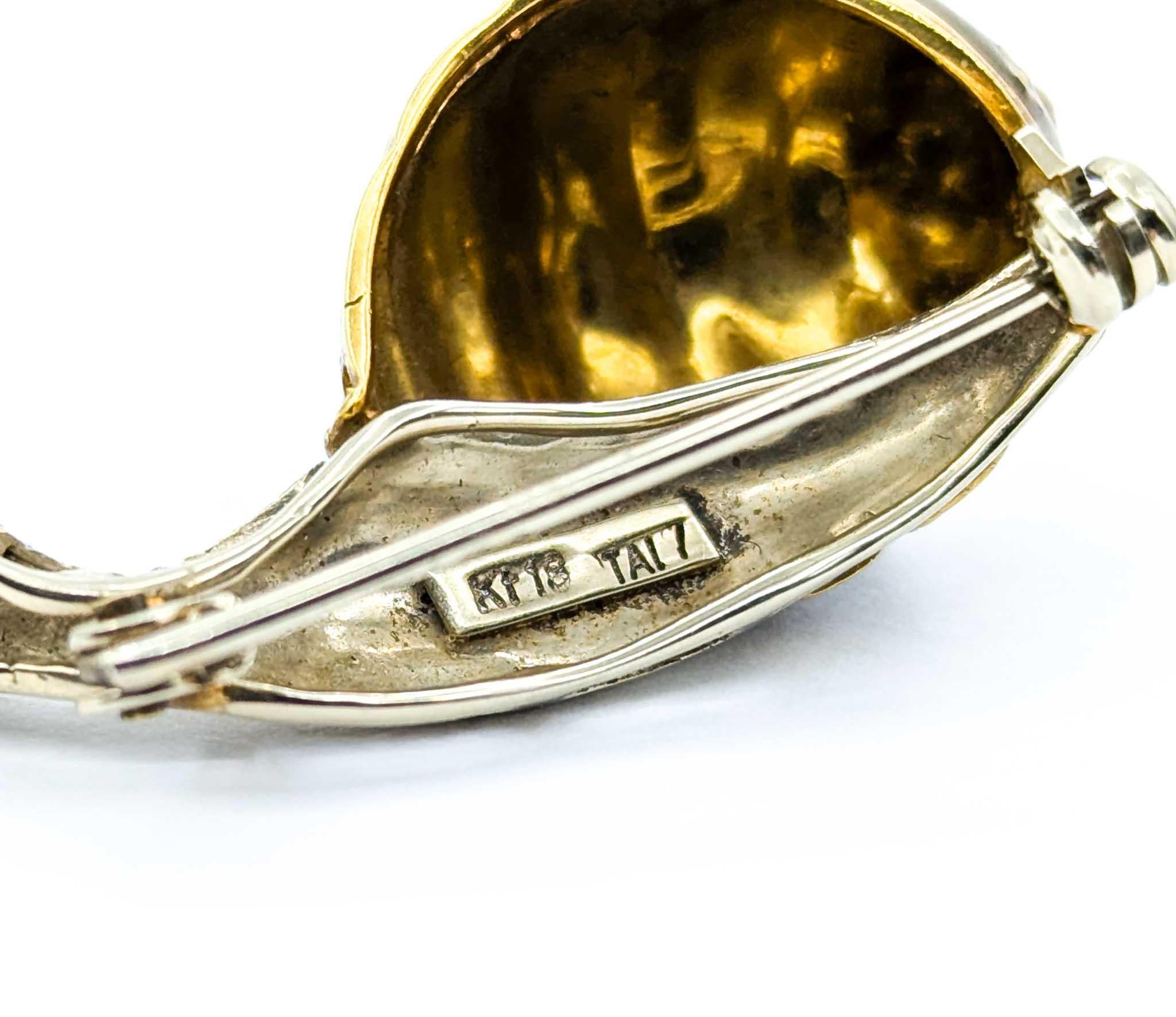 Charming Mid-Century Snail Brooch in 18k White Gold
Presenting this exquisite Mid-Century Snail Brooch, delicately crafted in 18k white gold. This whimsical yet elegant piece features 0.02ctw of twinkling rubies, adding a delightful touch of color