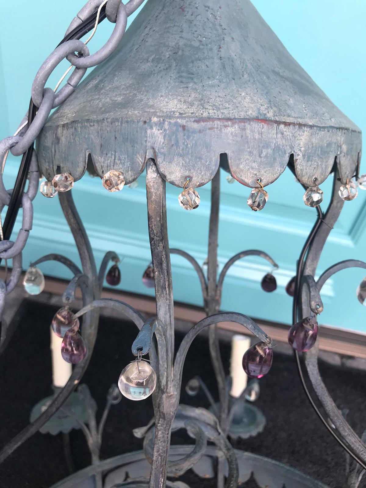 Charming Mid-20th Century iron chandelier with small crystal drops.