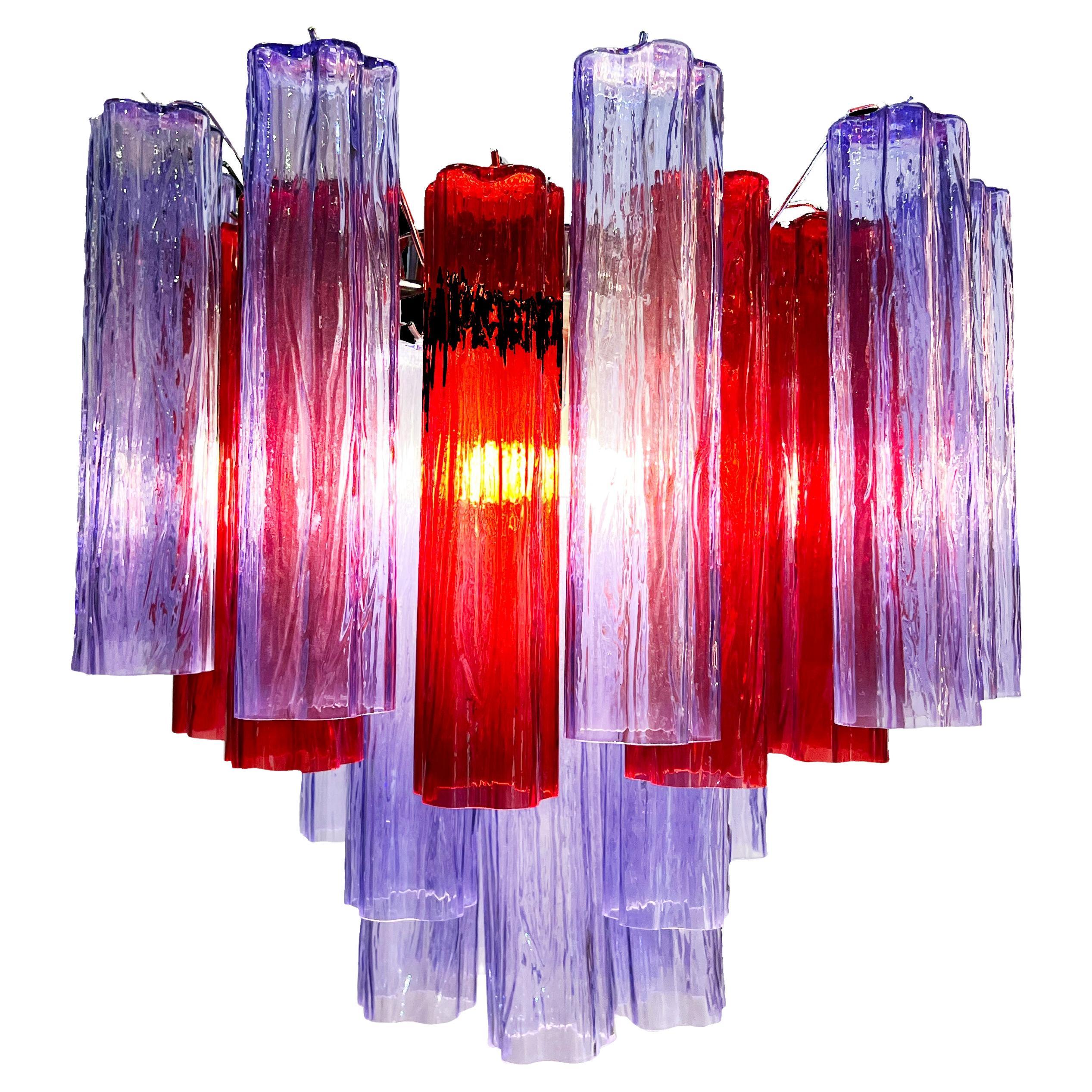 Fascinating Murano chandeliers. It is composed of 30 star shaped panes of pure murano glass. The height is adjustable according to the height of the ceiling. At no extra cost we will replace the original lamp holders with those in use in the USA.