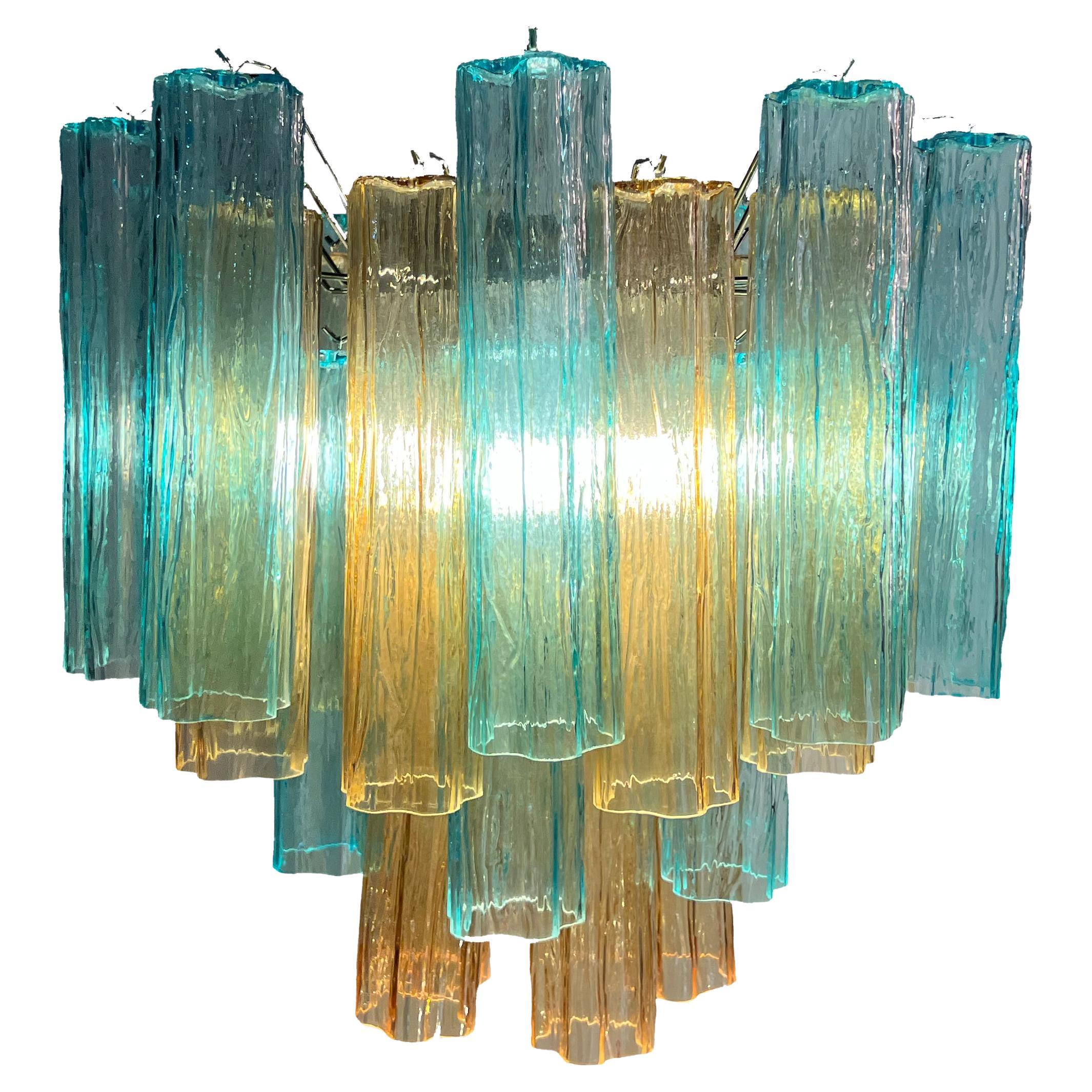 Fascinating Murano chandeliers. It is composed of 30 star-shaped panes of pure Murano glass. The height is adjustable according to the height of the ceiling. At no extra cost we will replace the original lamp holders with those in use in the USA.