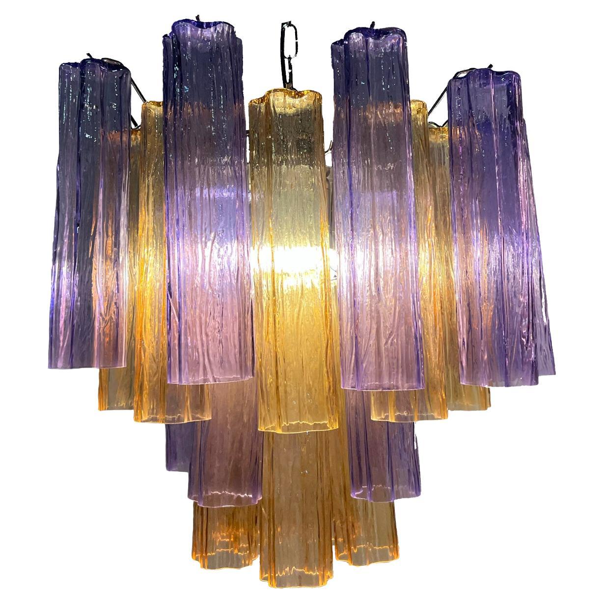 Fascinating Murano chandeliers. It is composed of 30 star shaped panes of pure Murano glass. The height is adjustable according to the height of the ceiling. At no extra cost we will replace the original lamp holders with those in use in the USA.