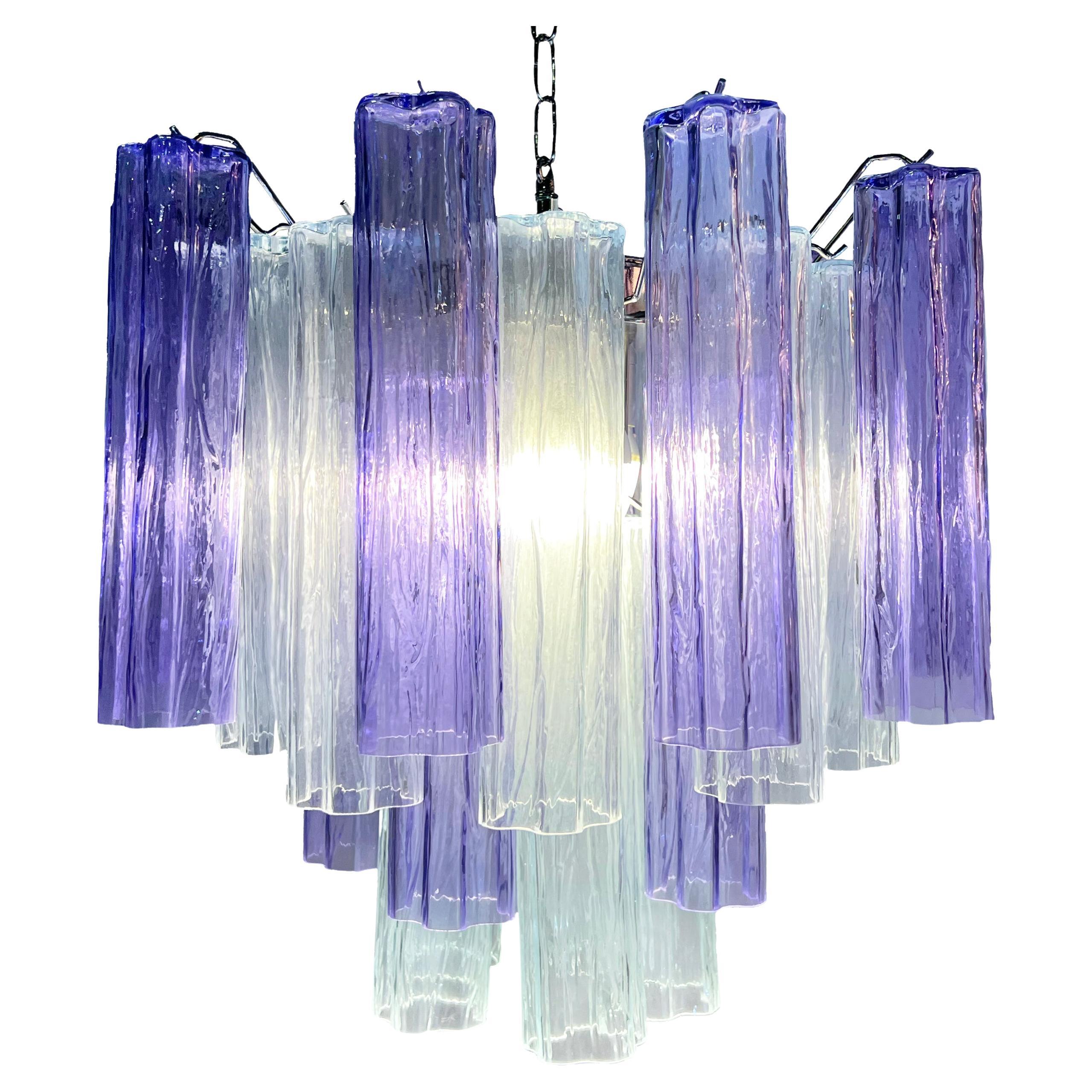 Fascinating Murano chandeliers. It is composed of 30 star shaped panes of pure Murano glass. The height is adjustable according to the height of the ceiling. At no extra cost we will replace the original lamp holders with those in use in the USA.