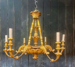 Charming  Neo baroque Chandelier in giltwood circa 1950