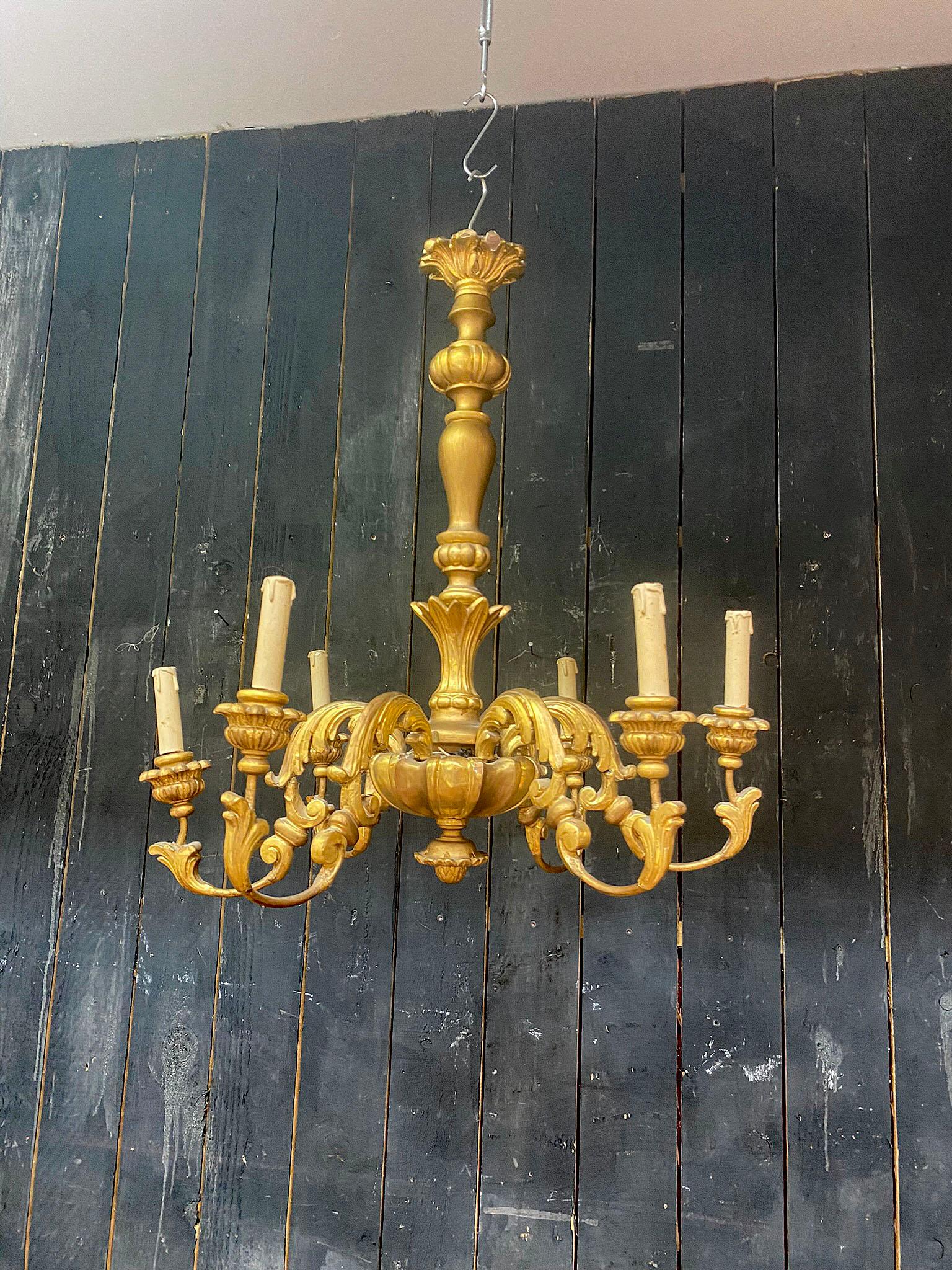Rococo Charming  Neo baroque Chandelier in giltwood circa 1950 For Sale