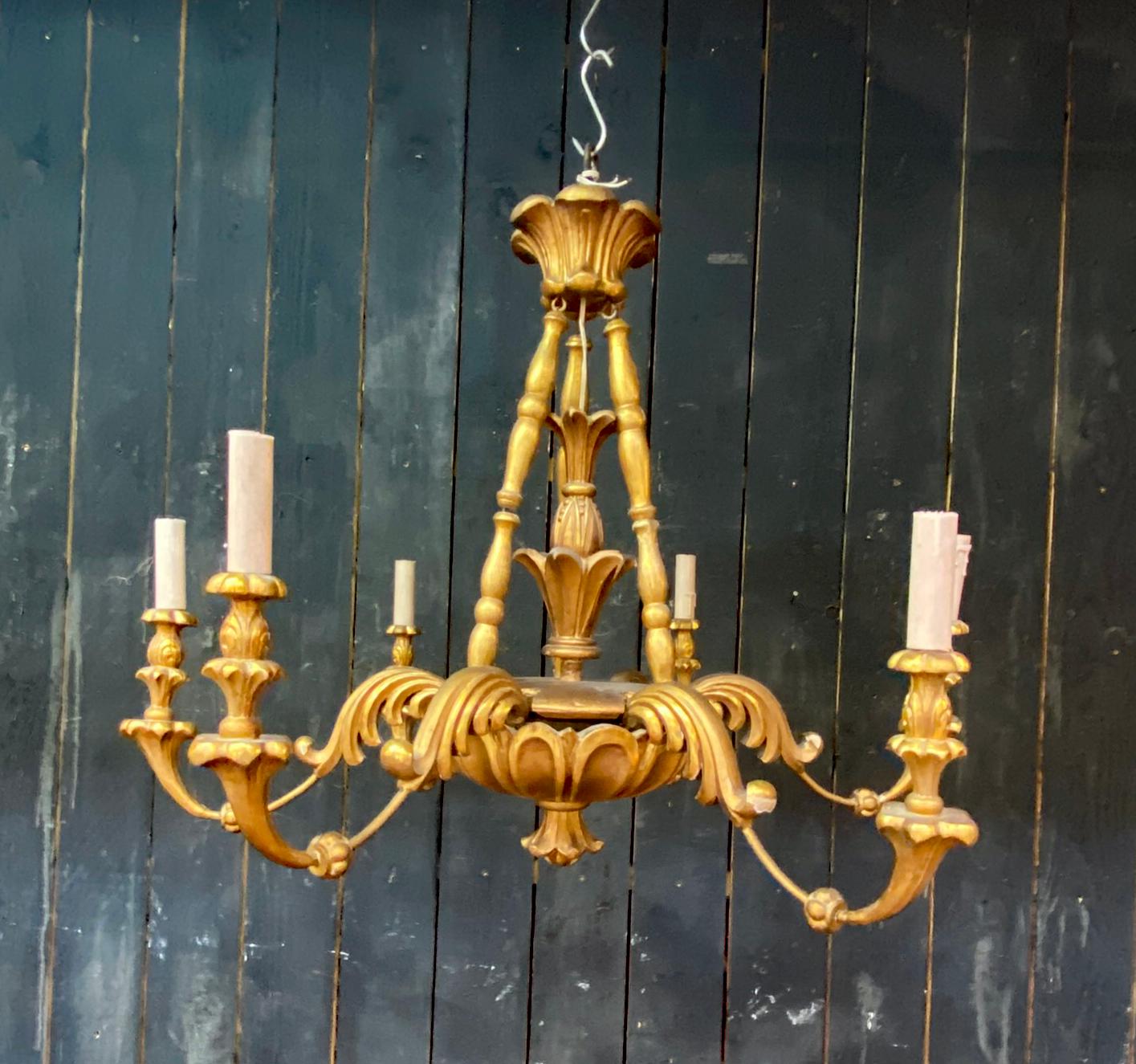 Rococo Charming  Neo baroque Chandelier in giltwood circa 1950 For Sale