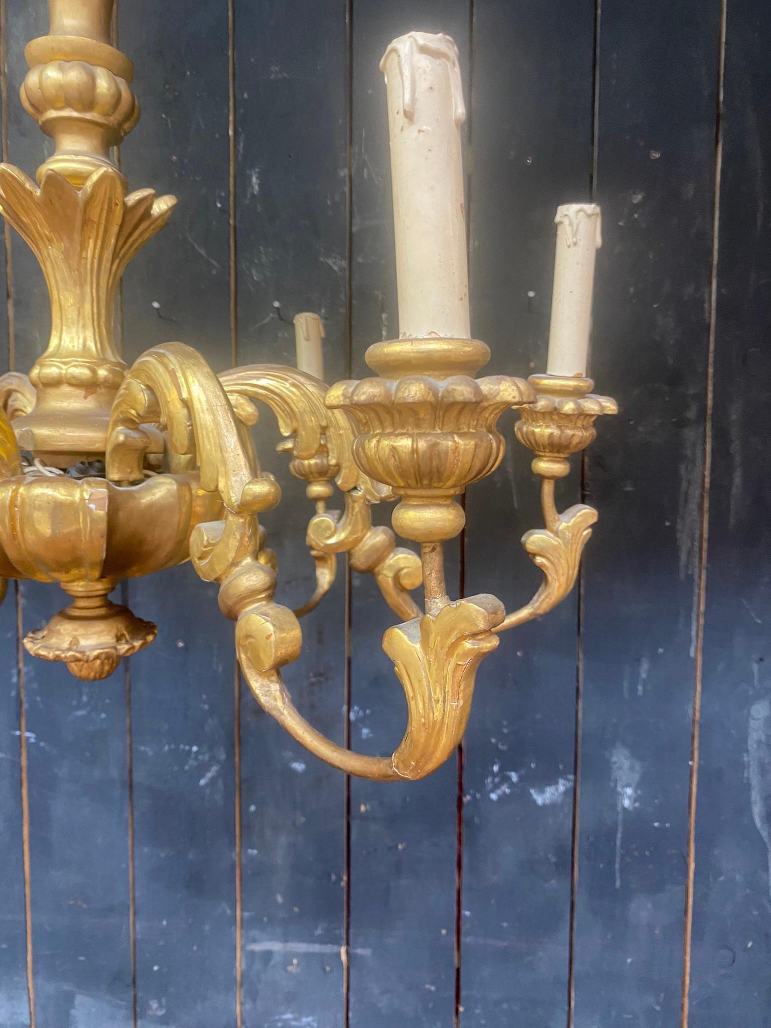 French Charming  Neo baroque Chandelier in giltwood circa 1950 For Sale