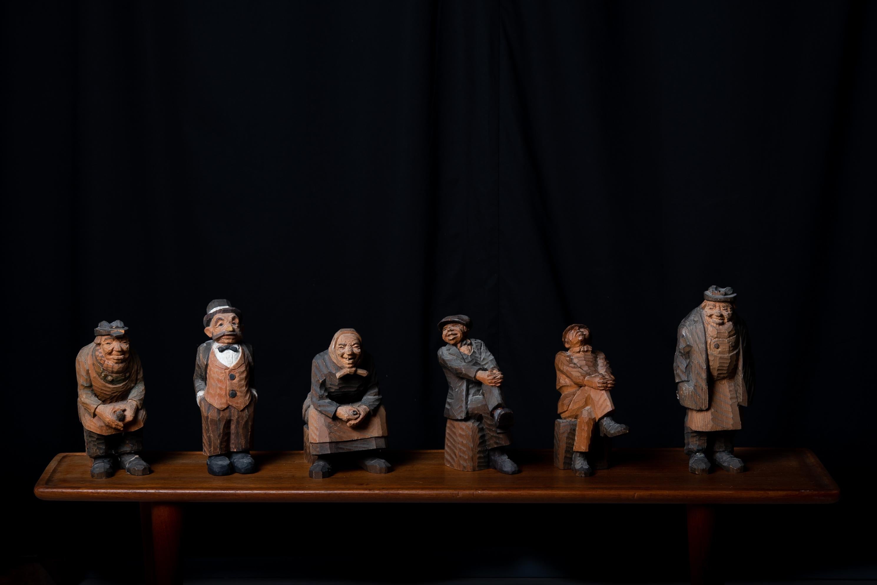 Charming hand-carved wooden figurines in folk art from northern Sweden. The set of 6 figurines are made by hand in solid Swedish pine and painted by Myrstens Johan in Järvsö, Hälsingland. They have the signature initials and the dating 1932. Varying