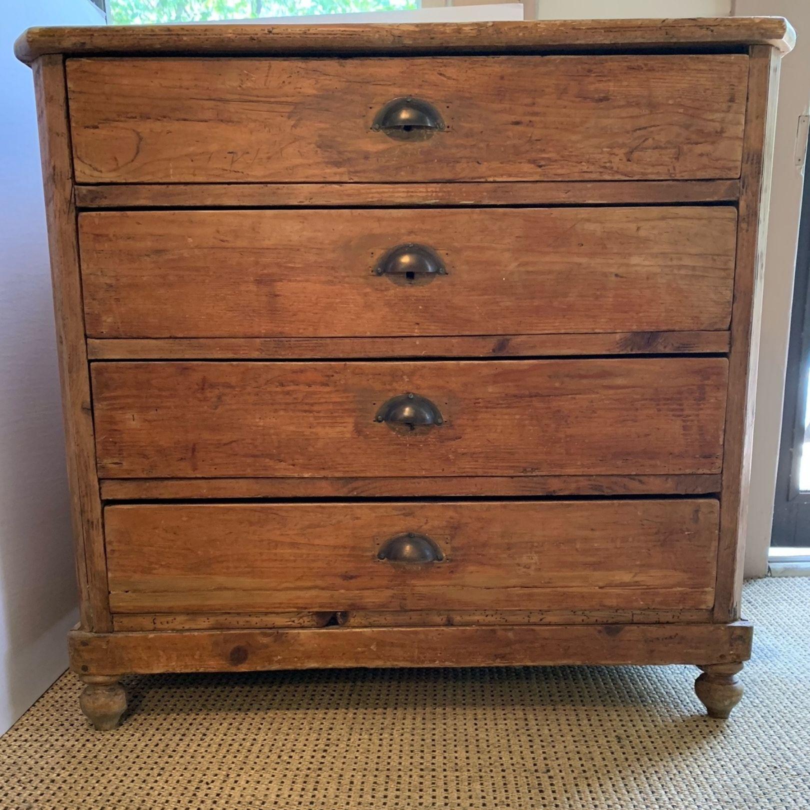 Vintage oak dresser, distressed surface, normal wear and tear consistent with age and use. Four drawers, brass hardware.