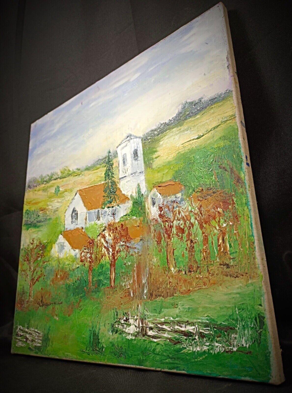 This beautiful oil painting on canvas captures a serene village church, offering a timeless piece of art perfect for enhancing any space. With its warm tones and fine details, this artwork brings the peaceful atmosphere of a quaint village to