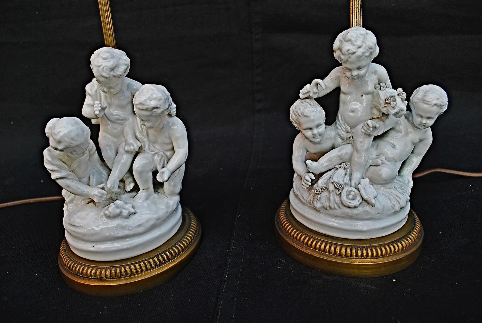 A real cute and charming pair of cherubs porcelain table lamps, the details are much nicer in person.