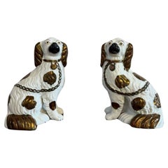 Charming pair of antique Victorian Staffordshire dogs