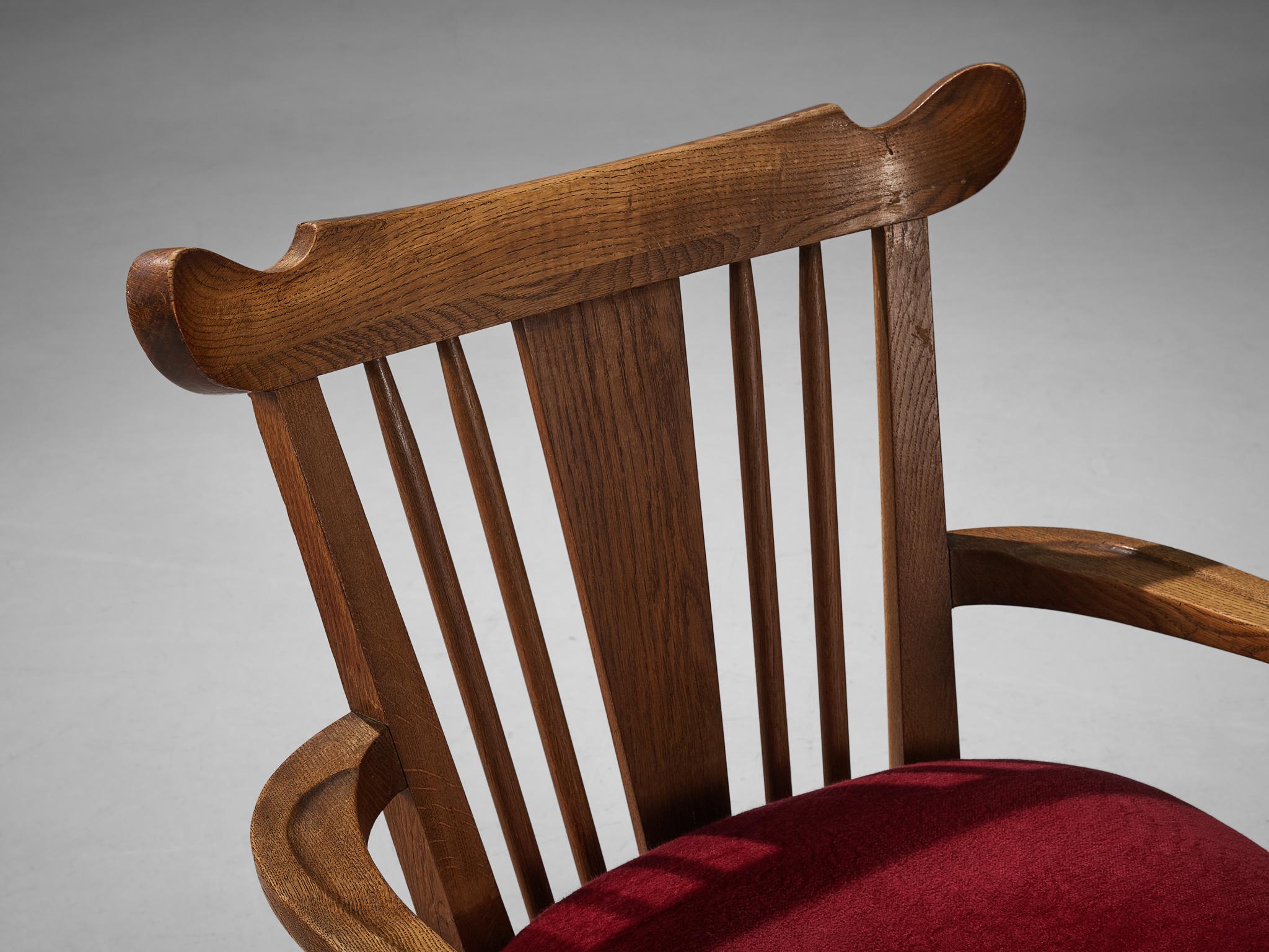 Mid-20th Century Sculpted French Pair of Armchairs in Oak and Burgundy Velvet Upholstery For Sale