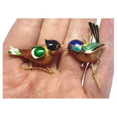 charming pair of life-like wren brooches in 18k gold with enamel and rubies