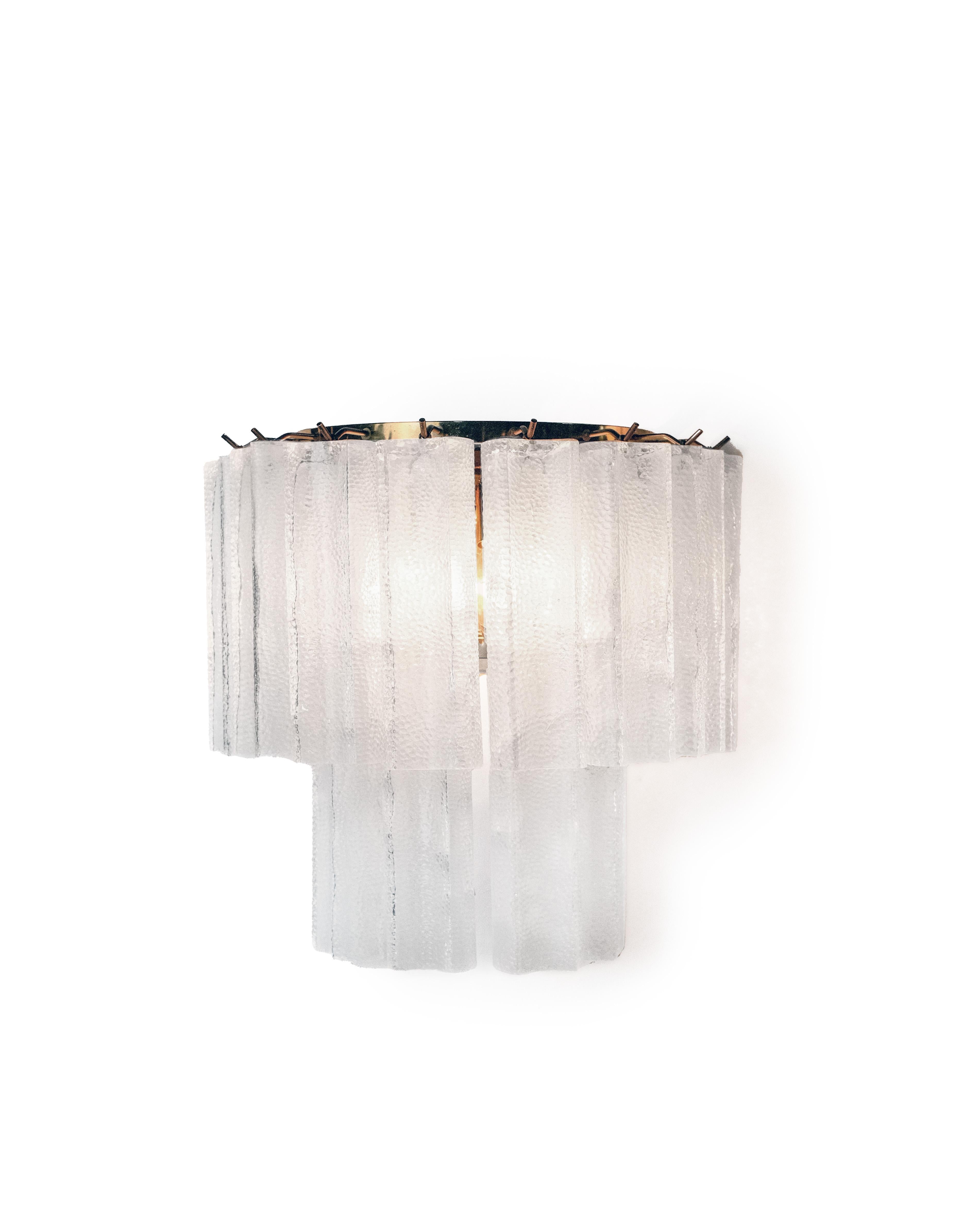 Pair of tronchi Vintage Italian Murano glass sconces by Mazzega. Each piece of glass is had blown into a thick oval shape. 