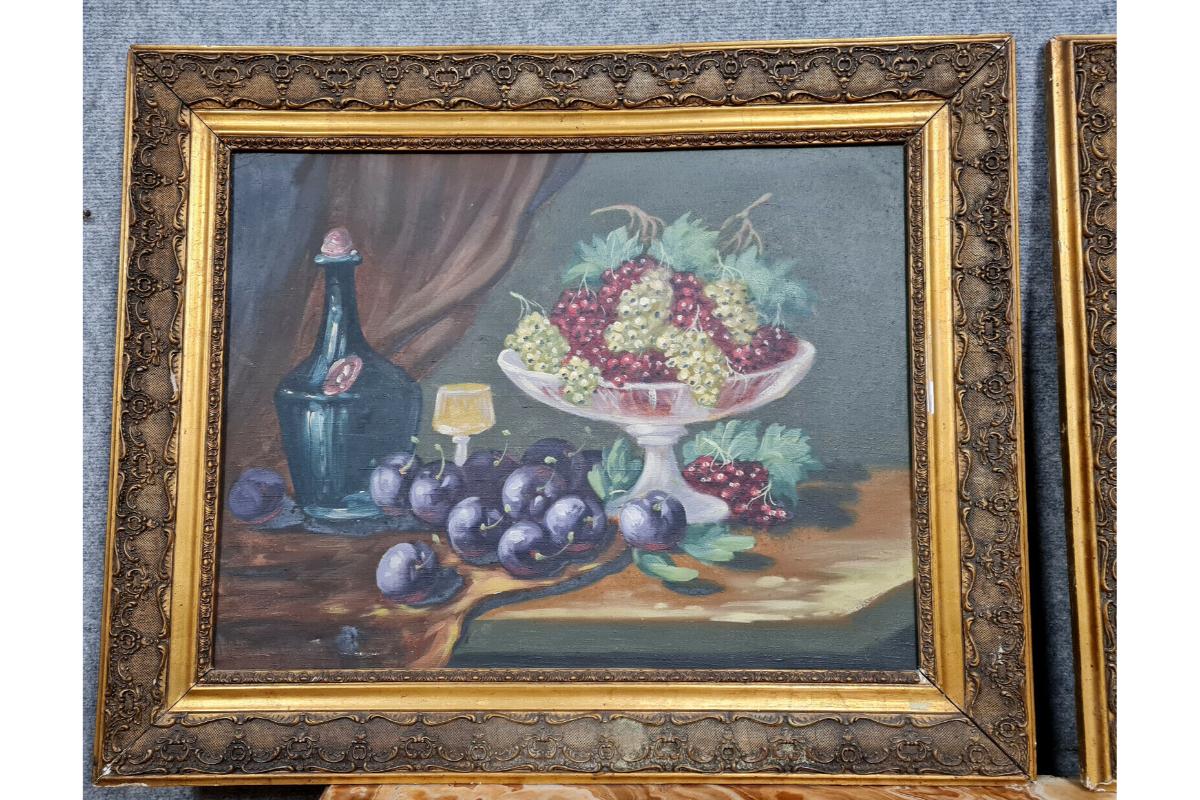 Elevate your interior with this charming pair of oil paintings on canvas, attributed to the 20th-century French artist J. Chatelin. These delightful pieces showcase exquisite still life compositions featuring vibrant fruits, expertly rendered with