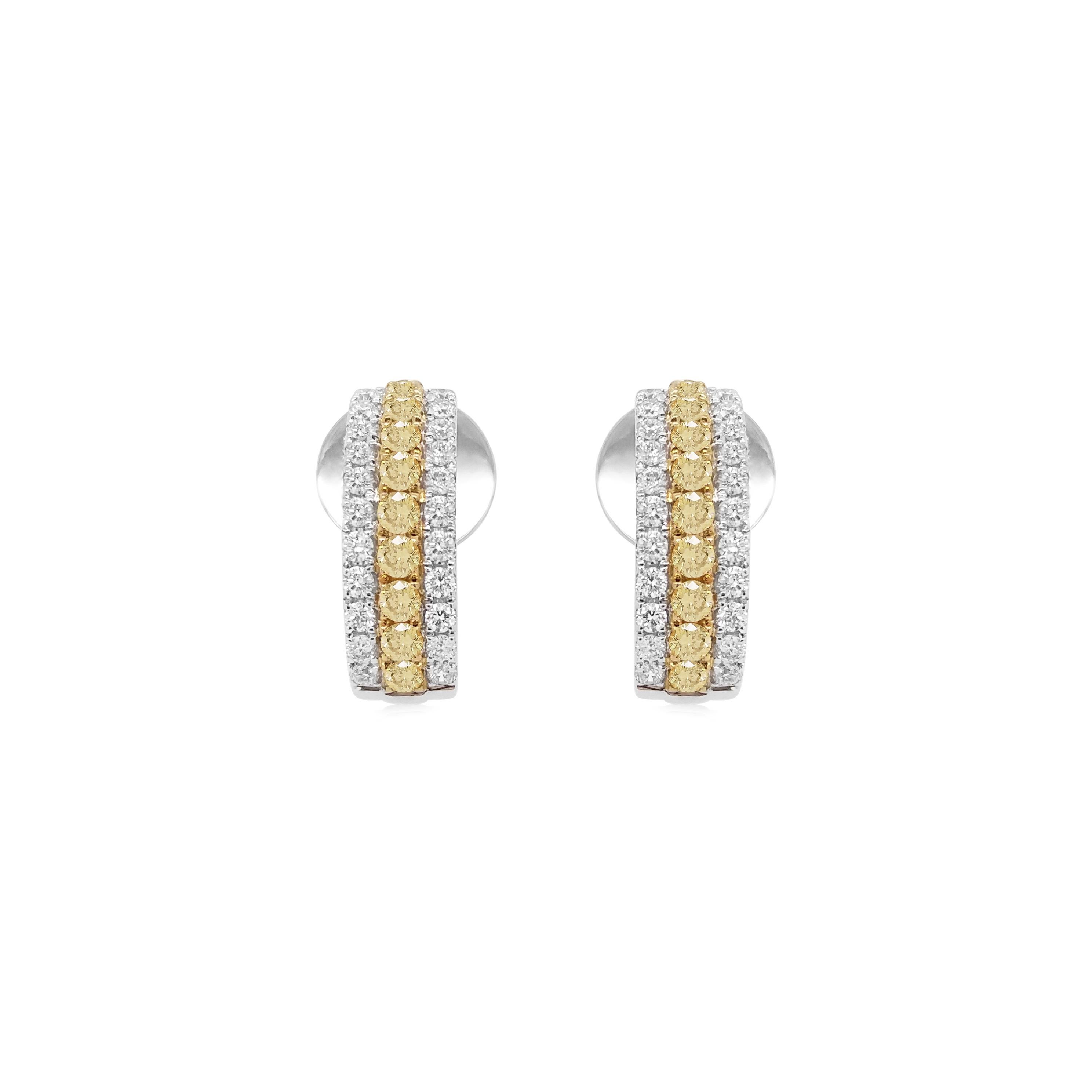 Elegantes und charmantes Paar gelber Diamant-Ohrringe, ideal für eine Veranstaltung im Freien mit klassischem Design

Gelbe Diamanten - 0,31 CT
Weiße Diamanten - 0,32 CT
Hergestellt in 18K Weiß- und Gelbgold

HYT Jewelry ist ein Unternehmen für