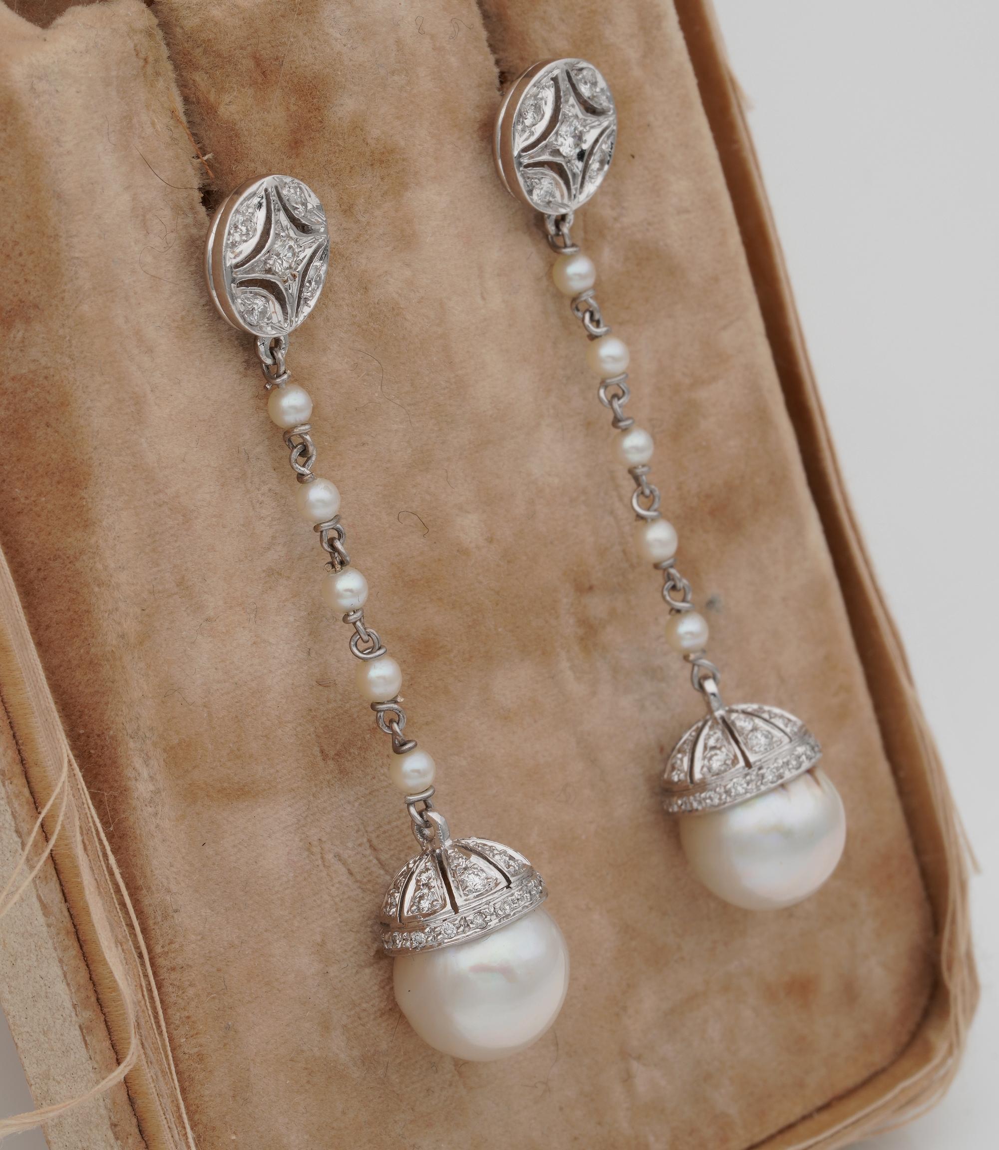 WOW! These are so Charming!

Up for sale these truly Charming vintage pair of long drop earrings set with large cultured Pearls & Diamonds
An exquisite pair so finely hand crafted of solid 18 KT white gold - marked
Italian origin
dating out from