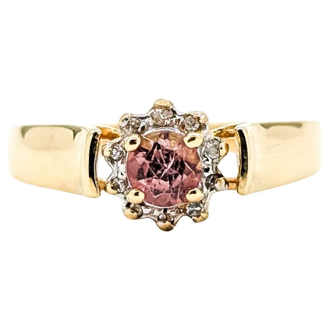 Charmante bague en or jaune 14k avec tourmaline rose et diamant
