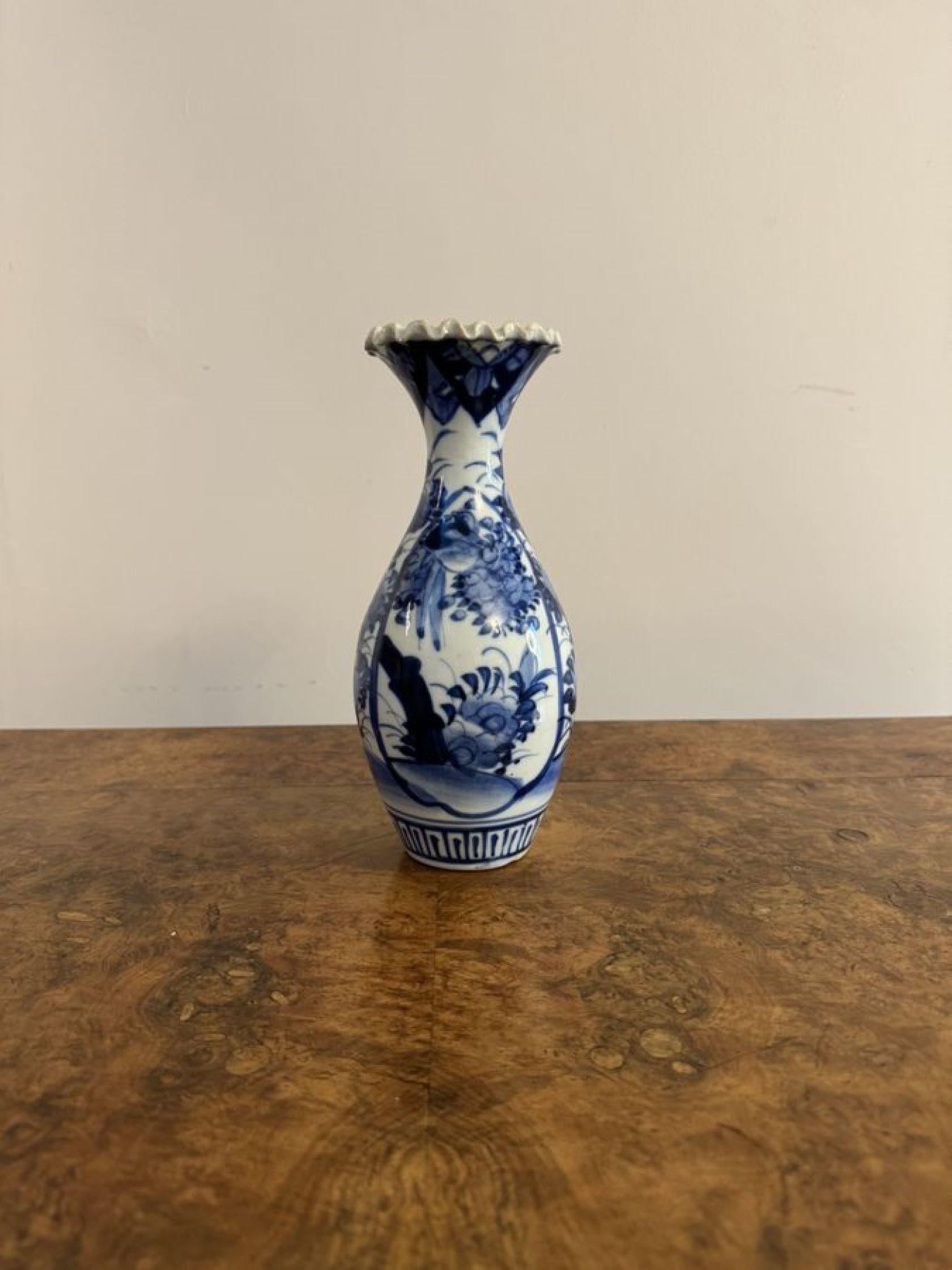 Charming quality antique Japanese imari blue and white baluster vase having a charming quality antique Japanese imari blue and white baluster vase hand painted in stunning blue and white colours decorated with flowers in blue on a white ground with