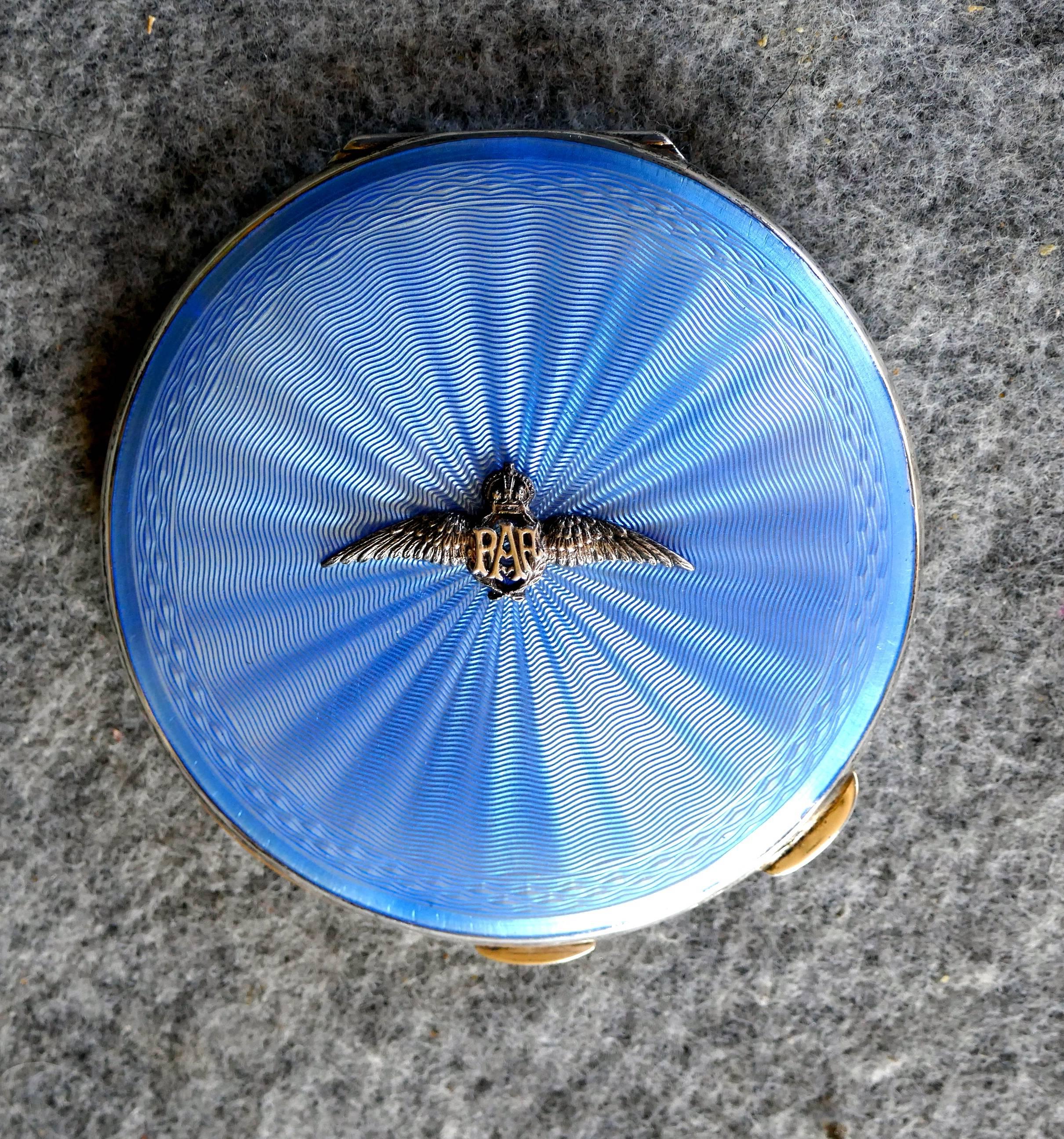 Charming RAF sterling silver and blue guilloche enamel compact case

An RAF Elizabeth II vintage sterling silver and guilloche enamel powder compact

This is a charming piece made in Birmingham 1952 by John William Barrett, the iridescent blue