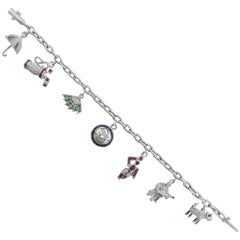Encantadora pulsera de rubíes, esmeraldas, zafiros y diamantes en oro de 18 quilates