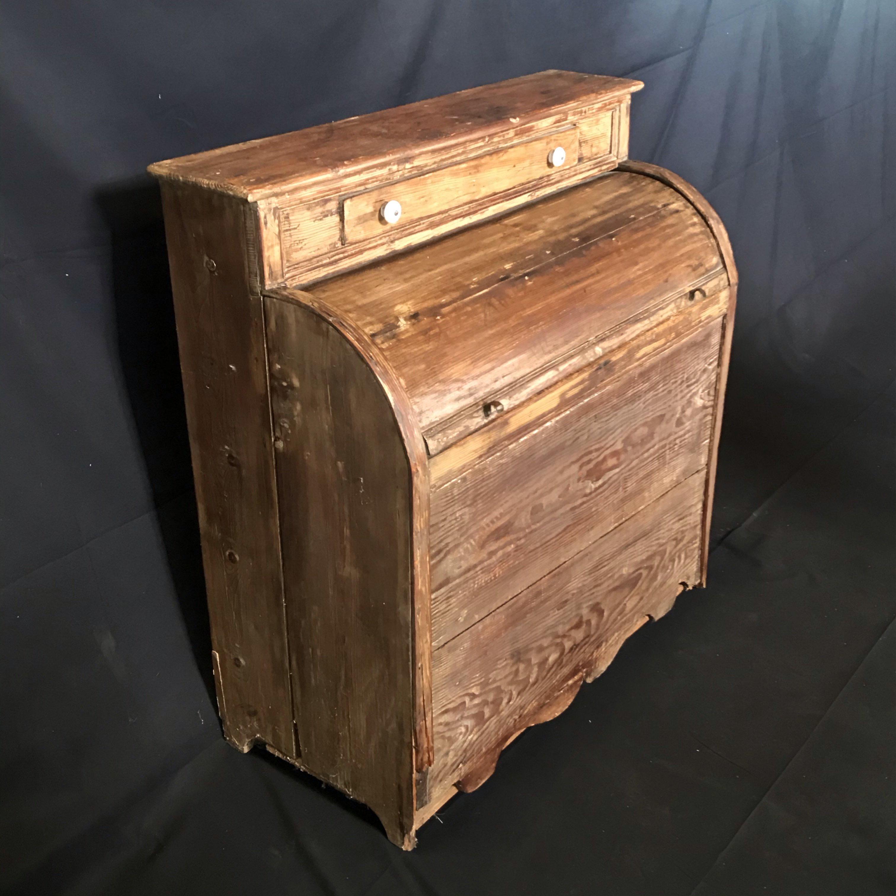 A charming rustic natural pine scalloped edged 19th century wood box or cabinet with match drawer and original interior bright blue paint, great in the corner of your fireplace!
#3485.