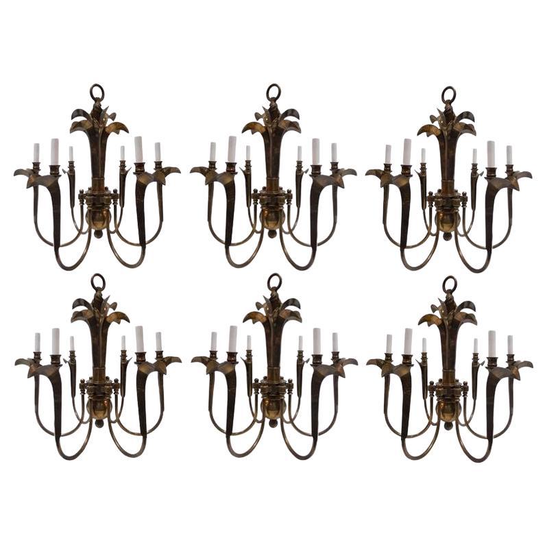 Charming Set of Six Brass Chandeliers For Sale