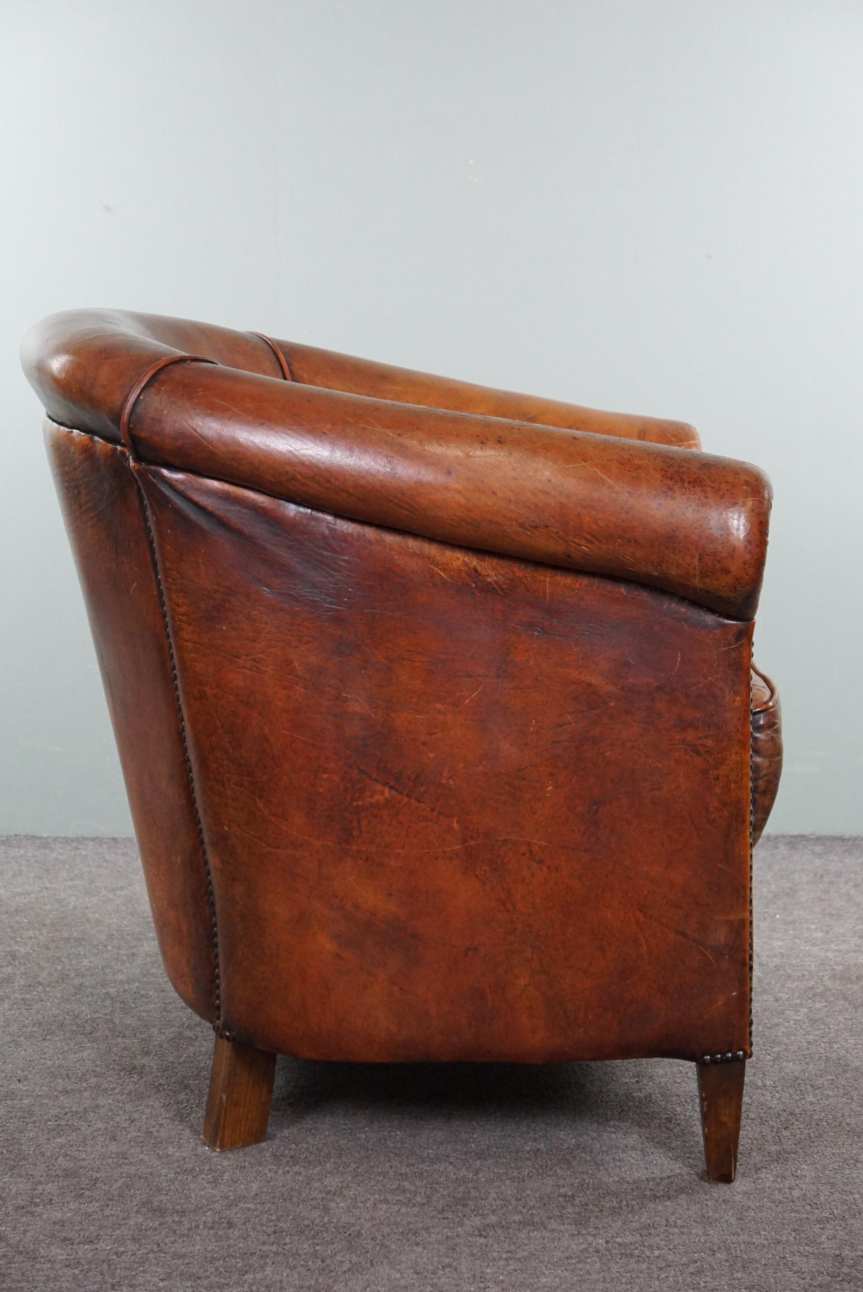 Dutch Charming sheepskin club chair. For Sale