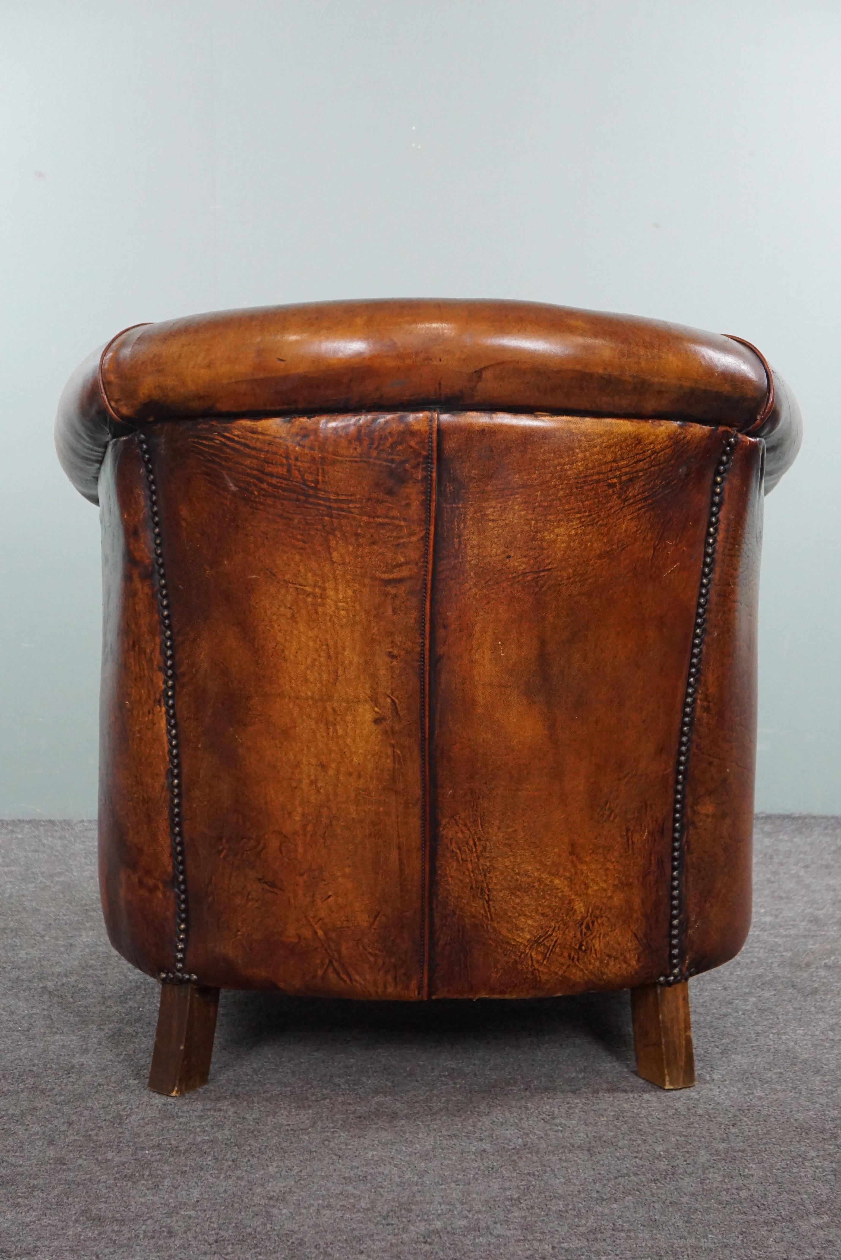 Charming sheepskin club chair. In Good Condition For Sale In Harderwijk, NL