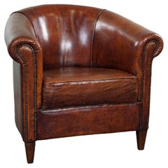 Vintage Charming sheepskin club chair.