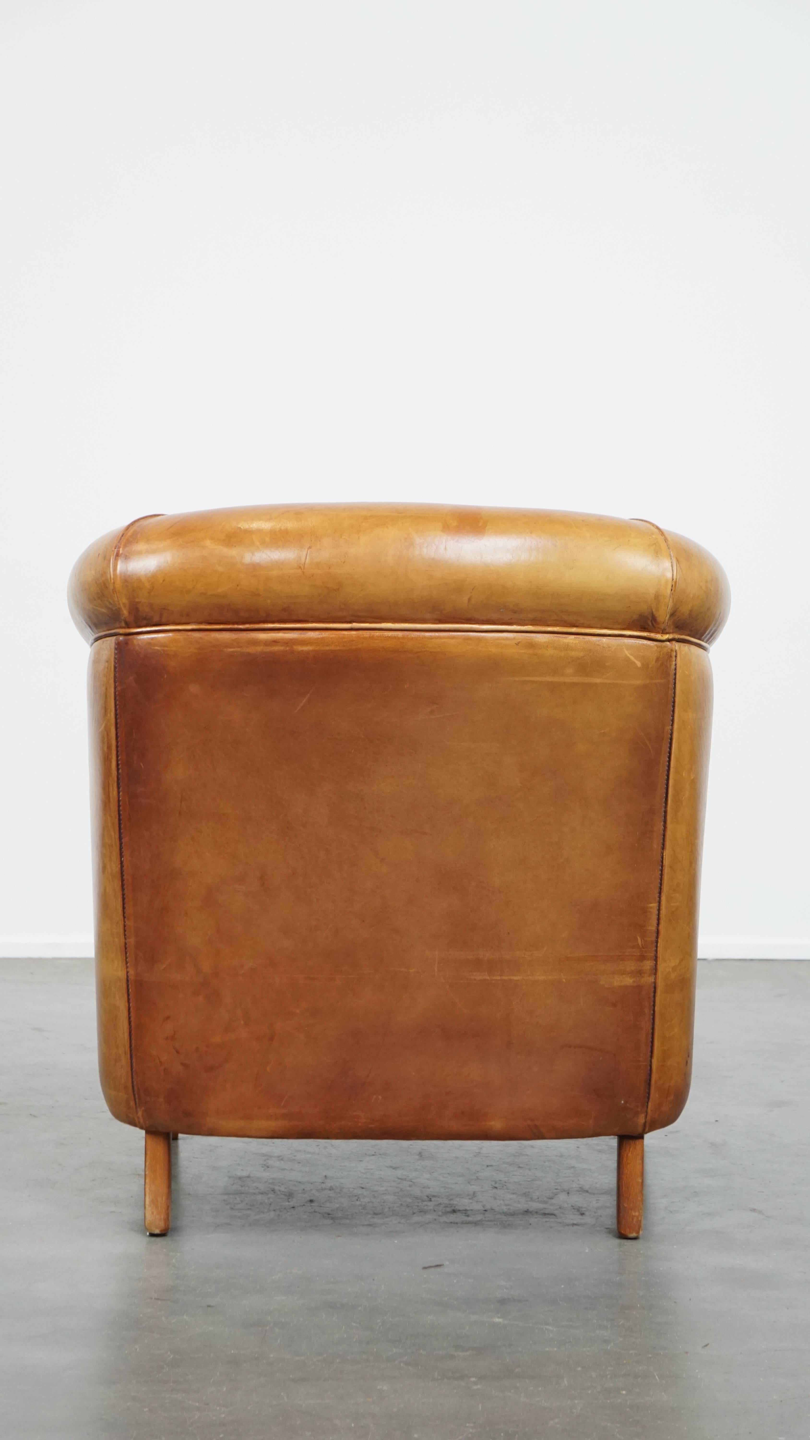 Hand-Crafted Charming Sheepskin Leather Club Chair with a Warm Color For Sale