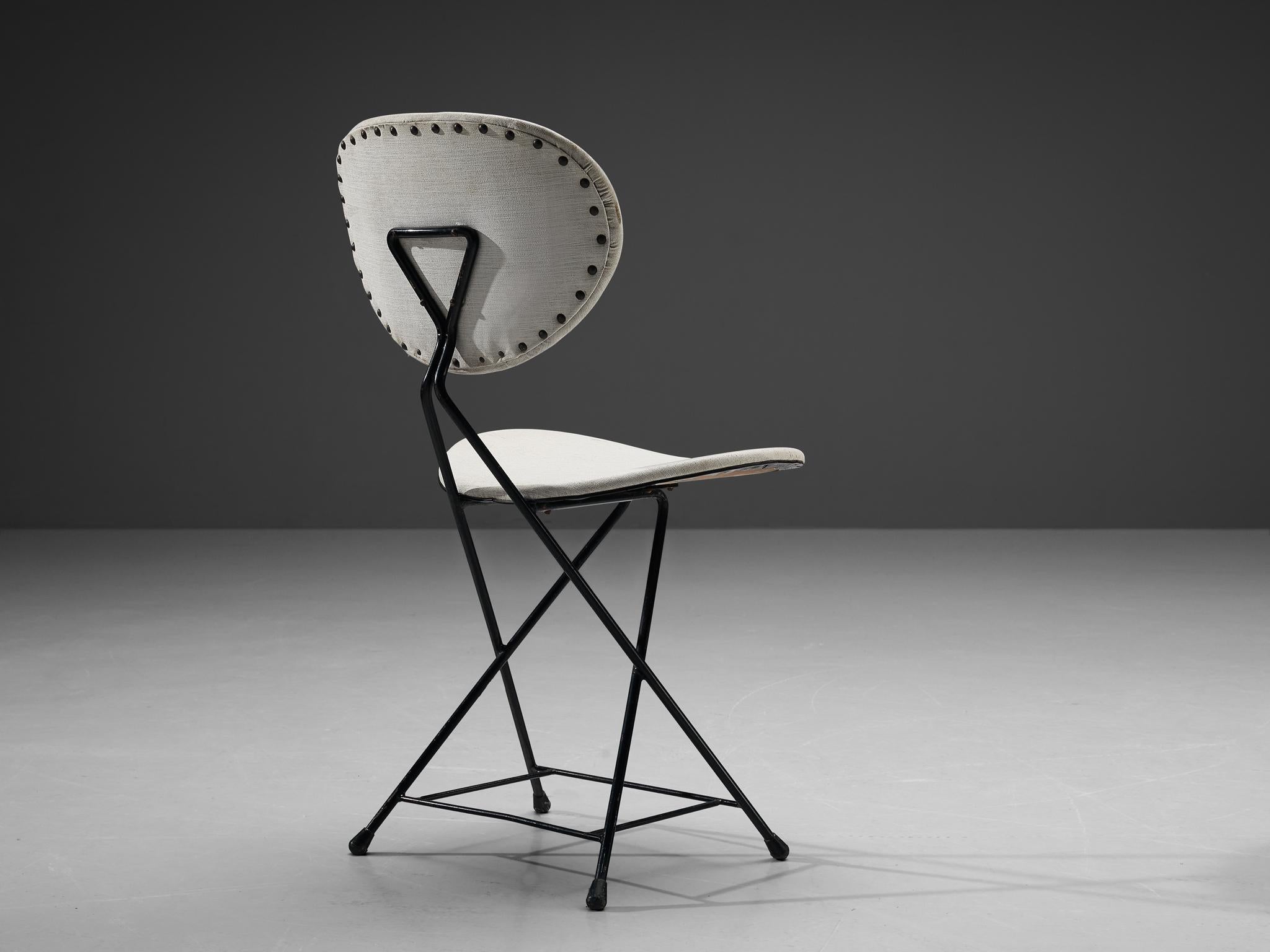 Rob Parry, dining chair, fabric, metal, lacquered metal, The Netherlands, designed in 1953

This chair is designed by Rob Parry and truly embodies the Dutch Minimalist Mid-Century design. The black lacquered metal frame is beautifully shaped