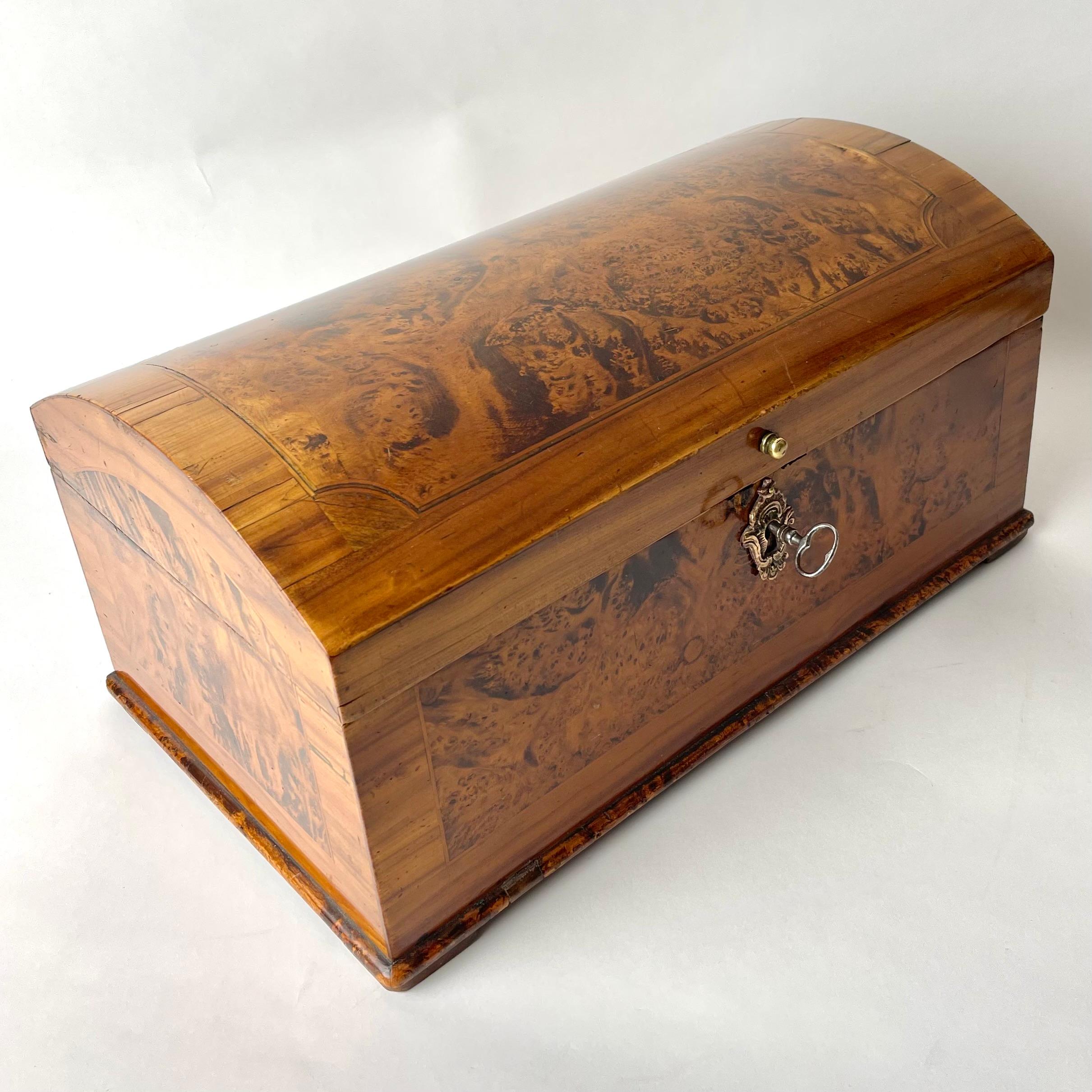 Charming small Chest in Alder Root and elm. Made in ”Mälardalen” in Sweden during Swedish Rococo in the 1760s. The inside in painted wood with a drawer on the side. Perfect for jewelry or watches.

Wear consistent with age and use 
