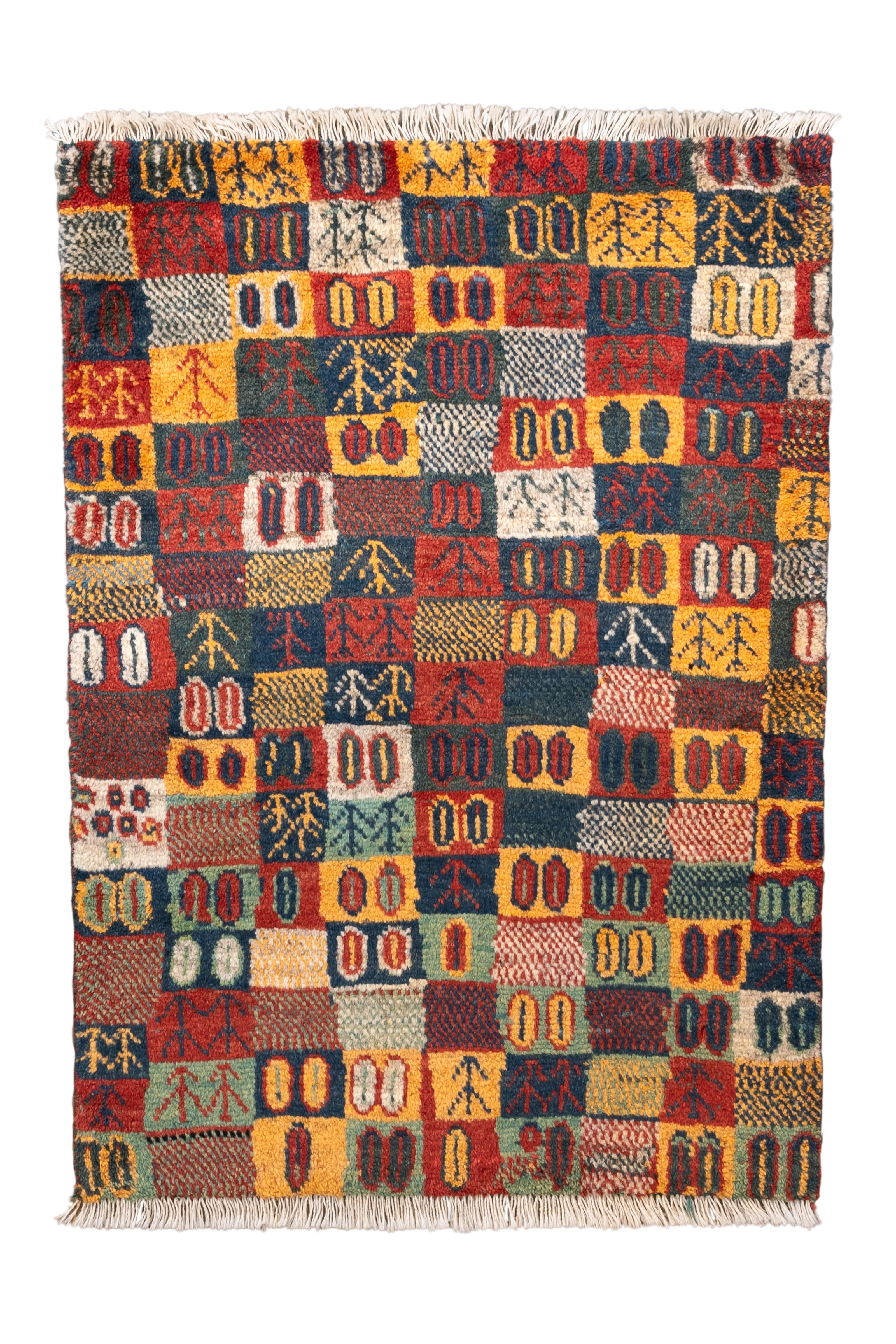 This vivid hand-knotted Gabbeh rug is a joyful example of tribal artistry, measuring just under 4 feet in length—perfect for a small space, entryway, or layered look. It features a vibrant mosaic of squares with classic Gabbeh motifs including the
