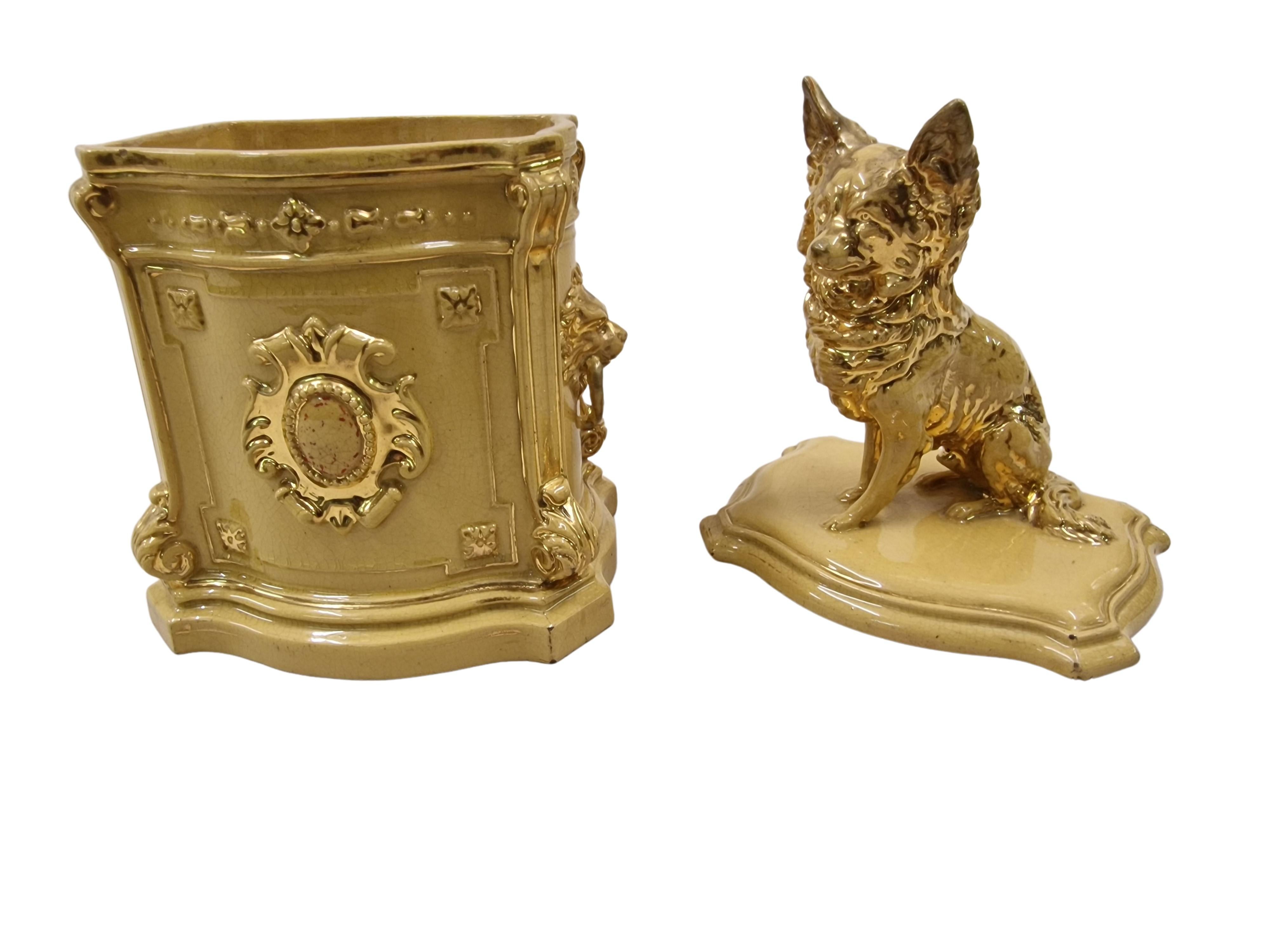 Very magnificent glazed ceramic tobacco box, an original from the end of the 19th century, by Bernhard Bloch, from Bohemia / Austria.

The box is wonderfully elaborated with a base that has a lot of baroque décor and a lid on which a dog is