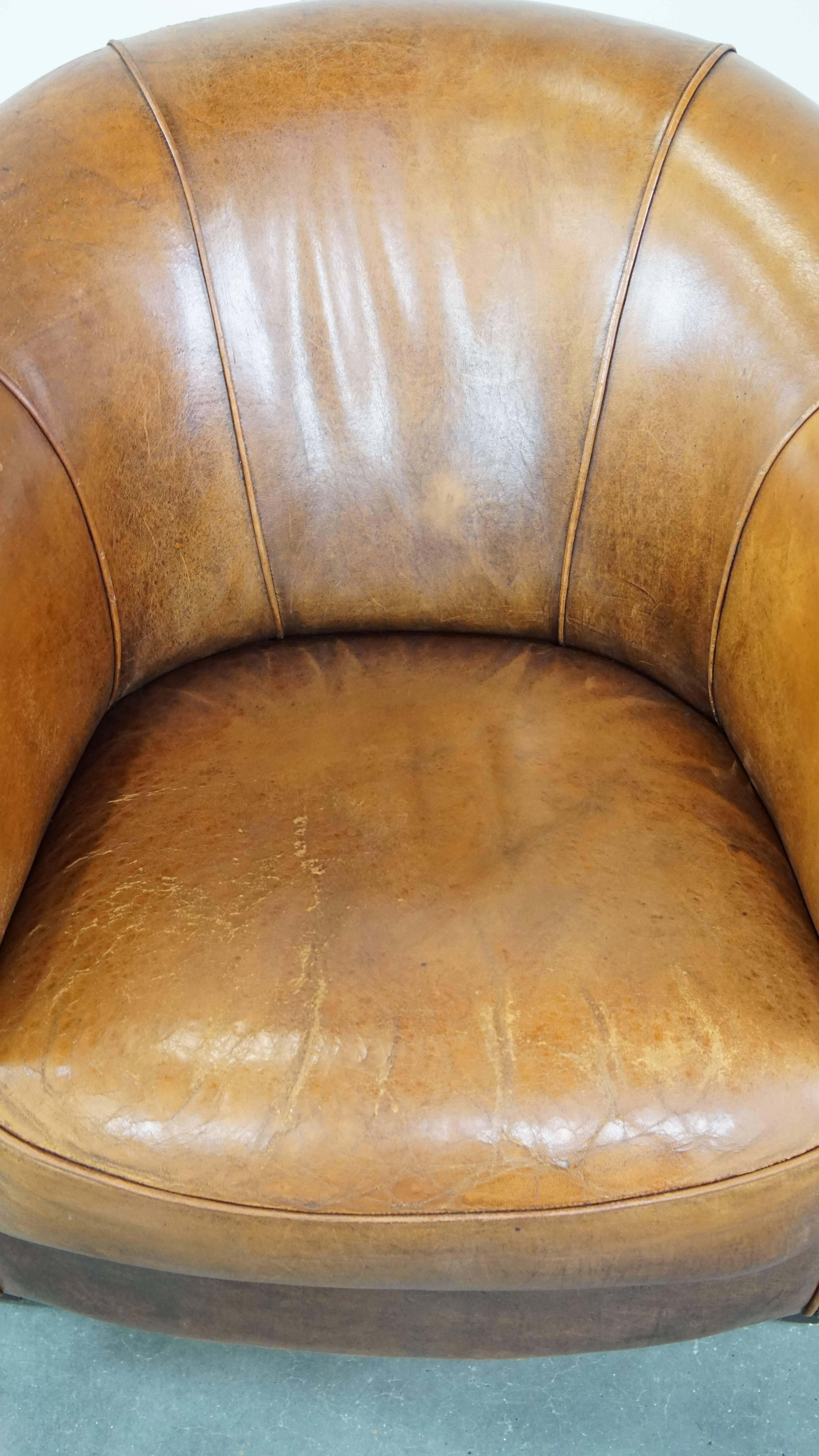 Sheepskin Charming, sturdy and comfortable cognac-colored sheepskin leather club armchair For Sale