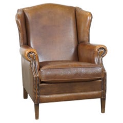Charming, subtle English style sheepskin wing chair with beautiful colours