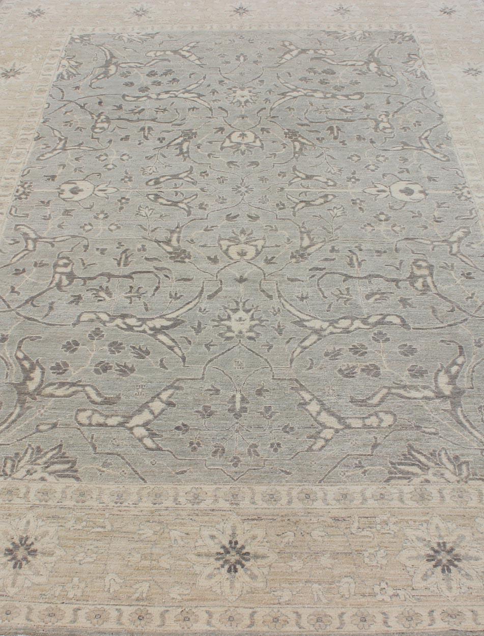 Contemporary Charming Tabriz Design Rug with All-Over Design in Gray's, Tan, and Cream For Sale