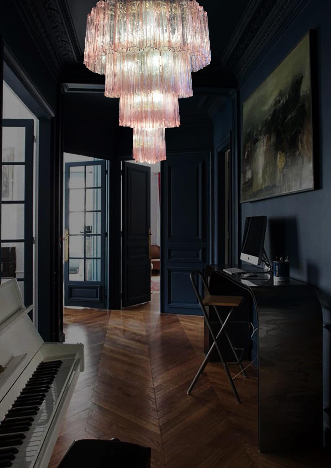 Stunning Murano chandeliers. The sophisticated pink color elegantly reflects the light. The height without chain is 112 cm. It can be made to the dimensions requested by the customer.