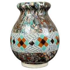 Charming tiny vase in "Terre-mêlée" ceramic by Jean Gerbino circa 1930