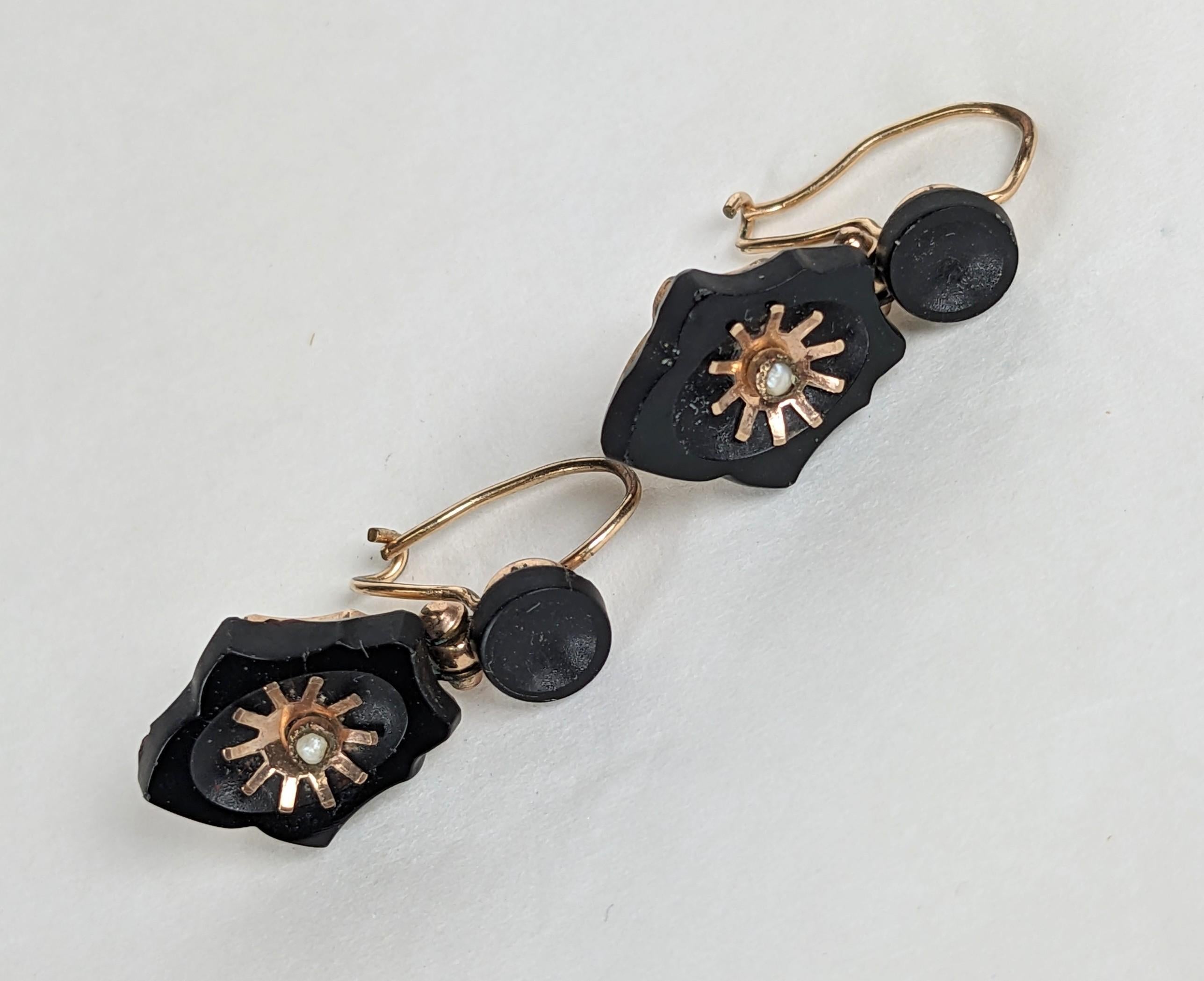 Charming Victorian Onyx Earrings of gold filled metal with seed pearls set in floral motifs. Ear wires are original. .75
