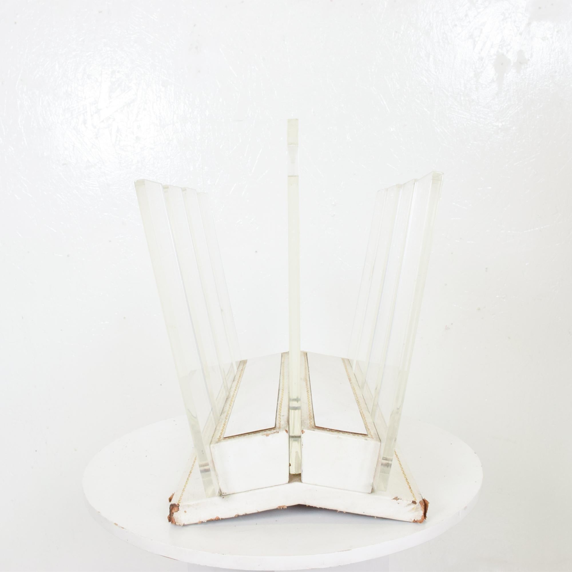 Charming vintage Lucite and leather modern magazine rack holder hand carry, 1970s
Style of Hollywood Regency Modern Charles Hollis Jones Era. No label apparent.
Thick Lucite on vintage aged Leather. Gold accent nail heads.
Dimensions: 14.5 T x
