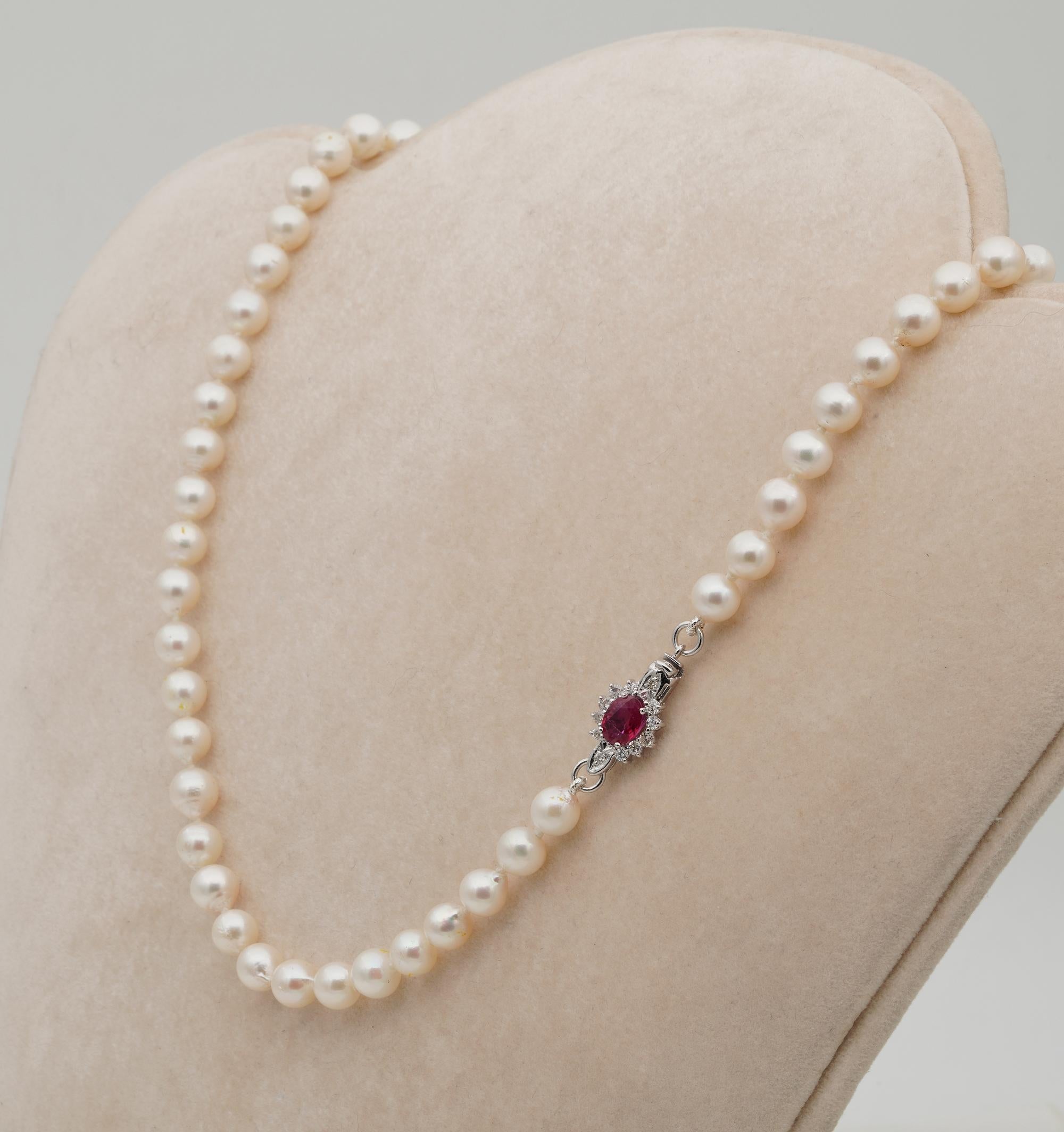 pearl necklace with ruby clasp