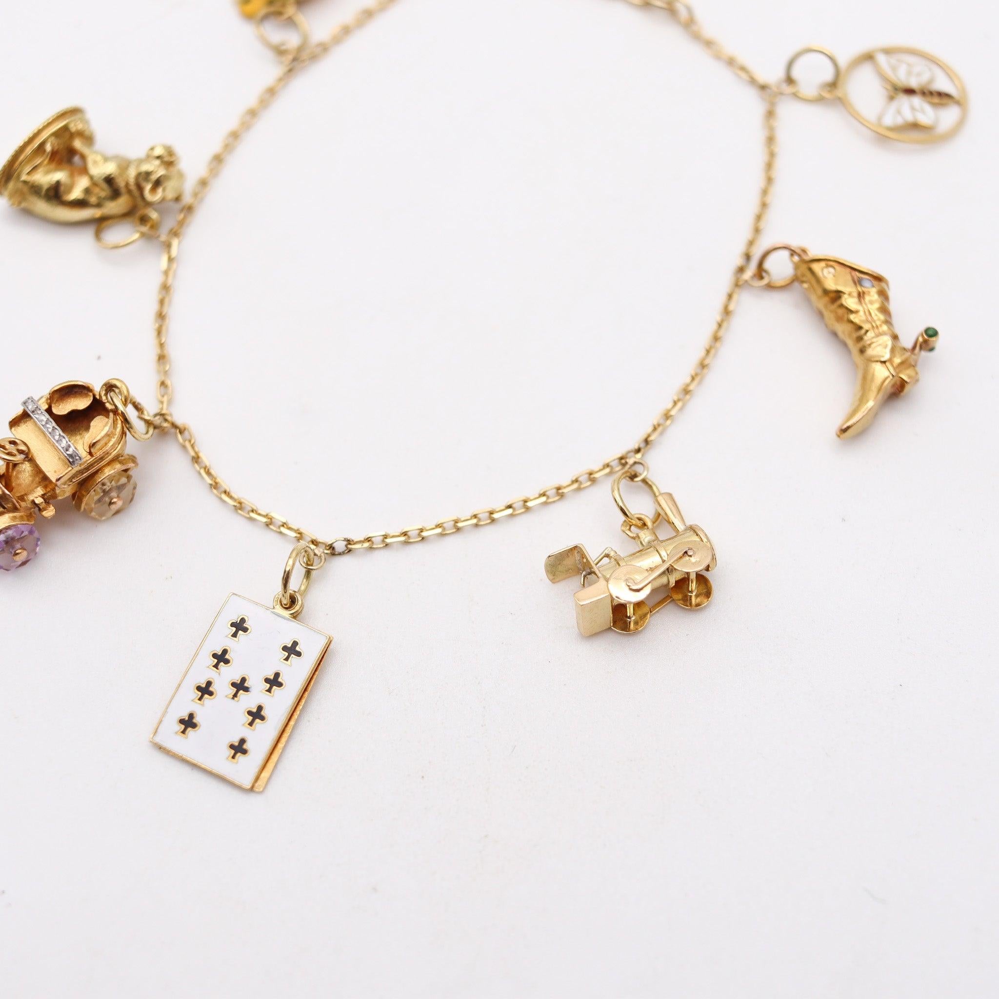 Moderniste BRACELET DE CHARMES 1960 Bracelet de 7 charms en or jaune 18Kt de style moderniste italien en vente